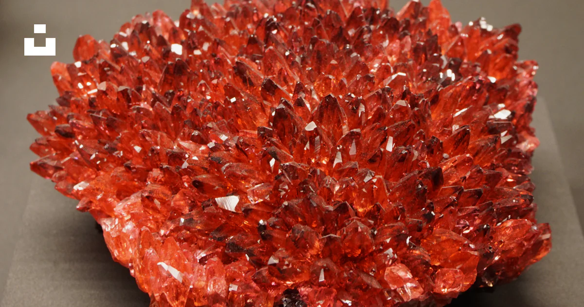 A red rock sitting on top of a table photo β Free Terra mineralia Image ...