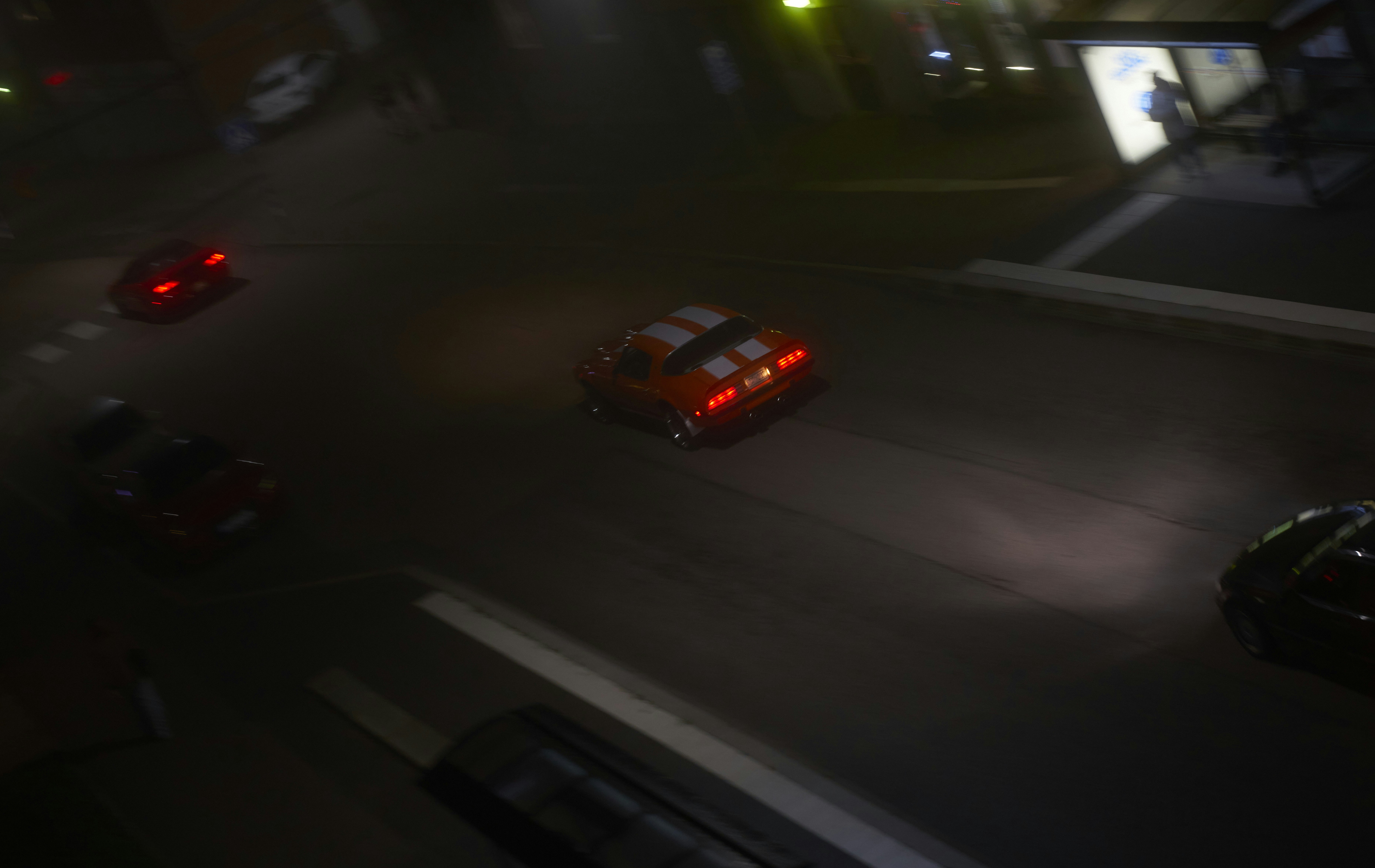 A blurry photo of a city street at night