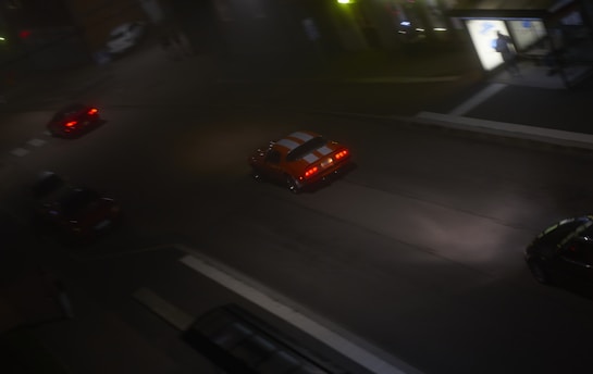 A blurry photo of a city street at night