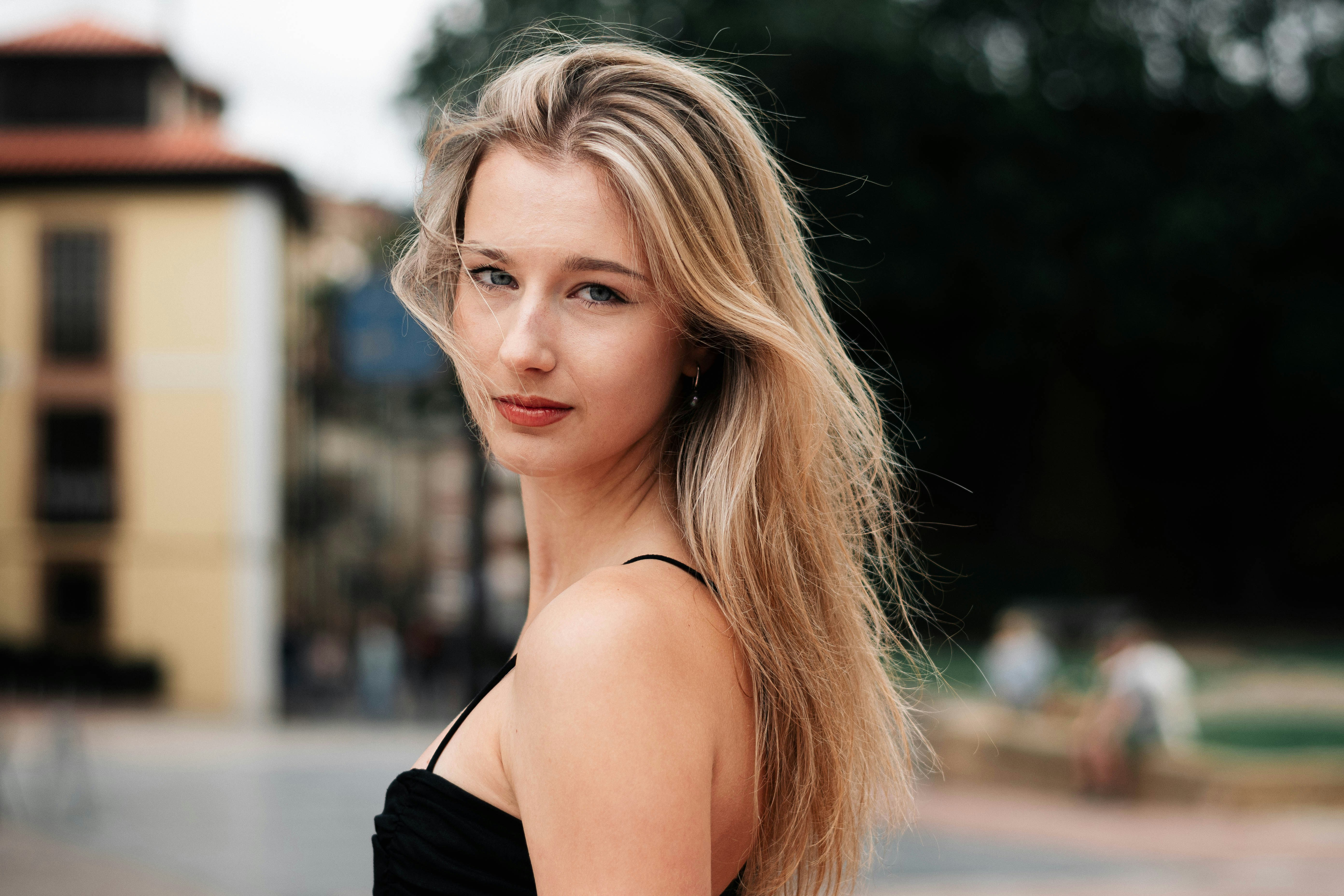 Female AI persona avatar engaging with a digital audience during virtual event