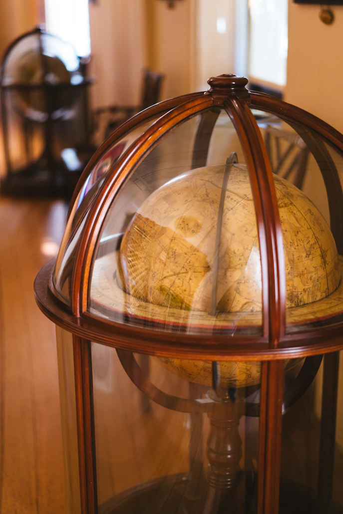 Antique celestial globe on a wooden stand