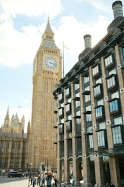 A large clock tower towering over a city