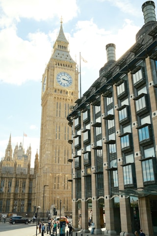 A large clock tower towering over a city