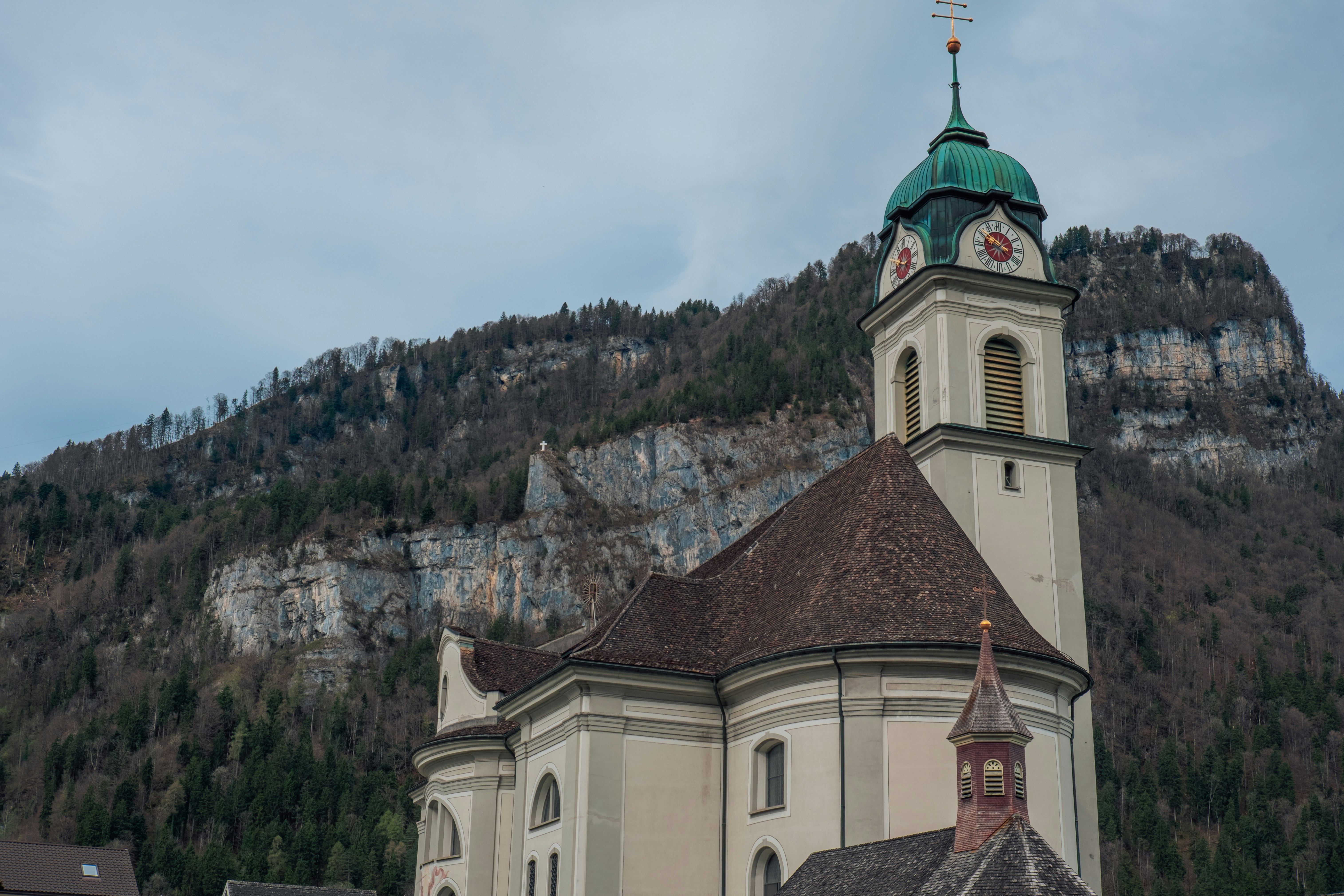A church with a steeple and a steeple on top