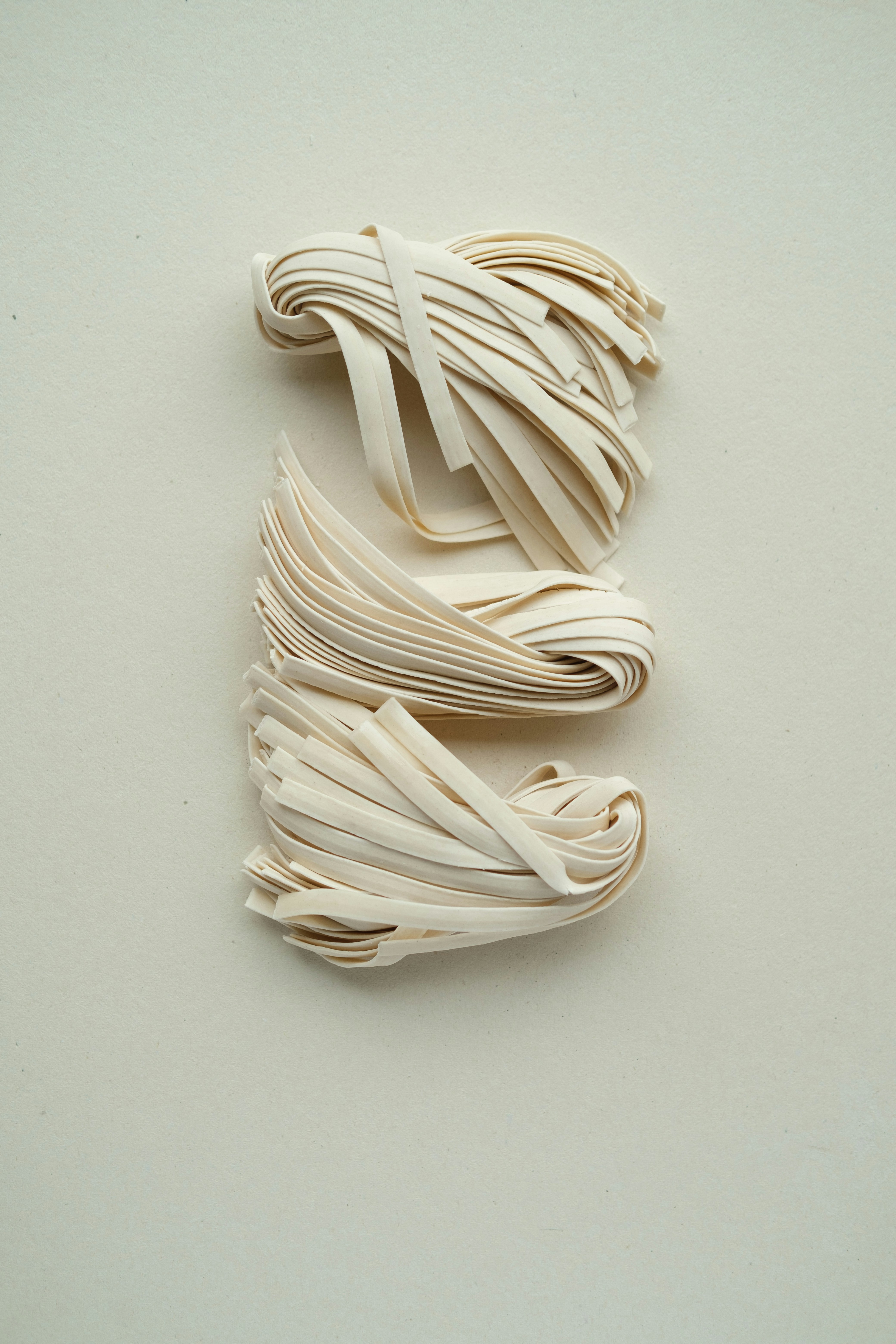 A white string is on a white surface photo – Free Lelystad Image on ...