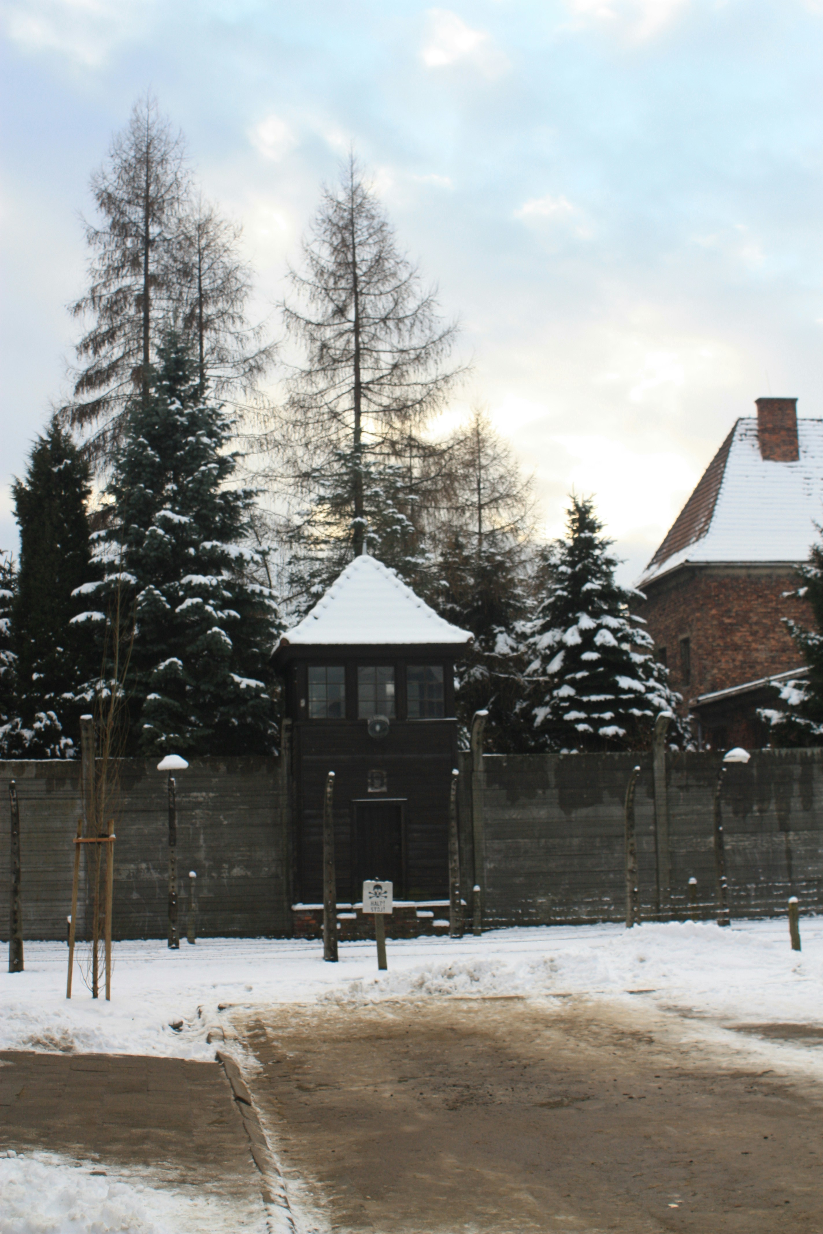 A fenced in area with snow on the ground
