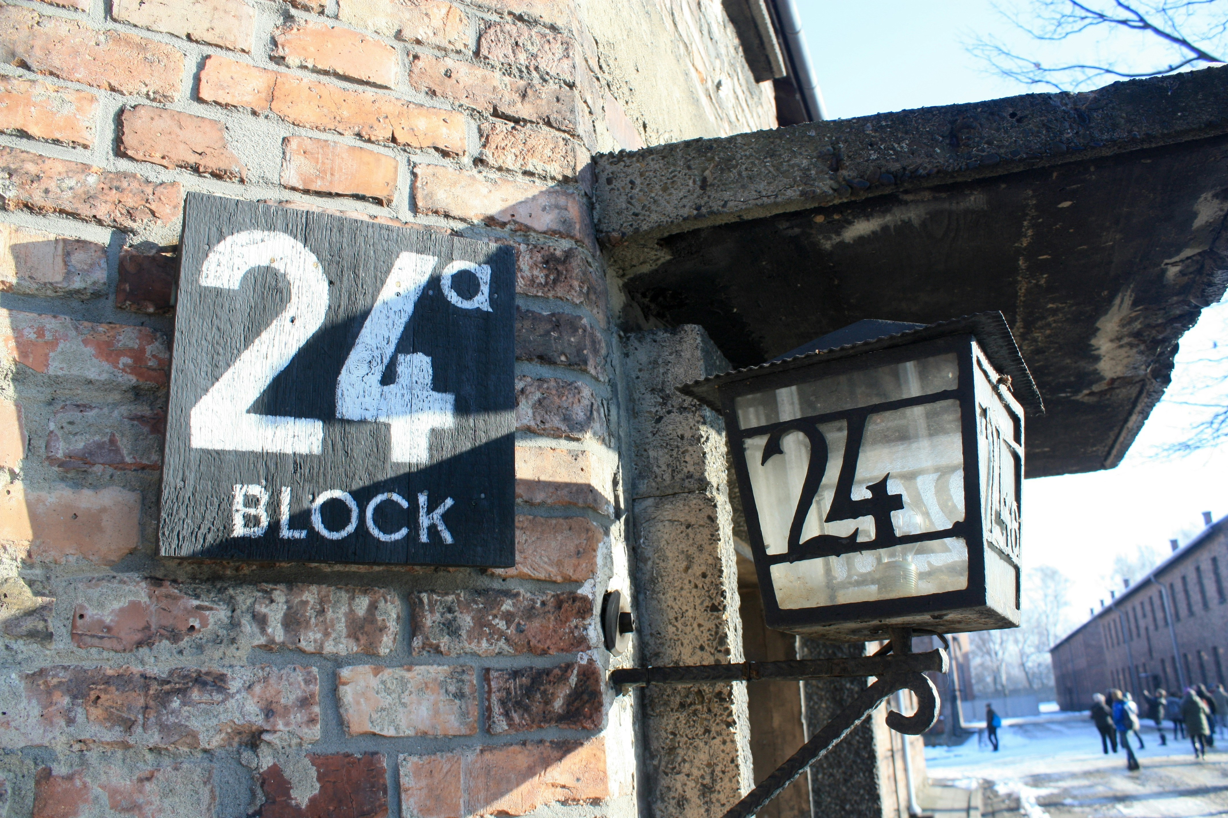 A brick building with a clock on the front of it