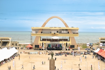 An aerial view of a beach with tents and people