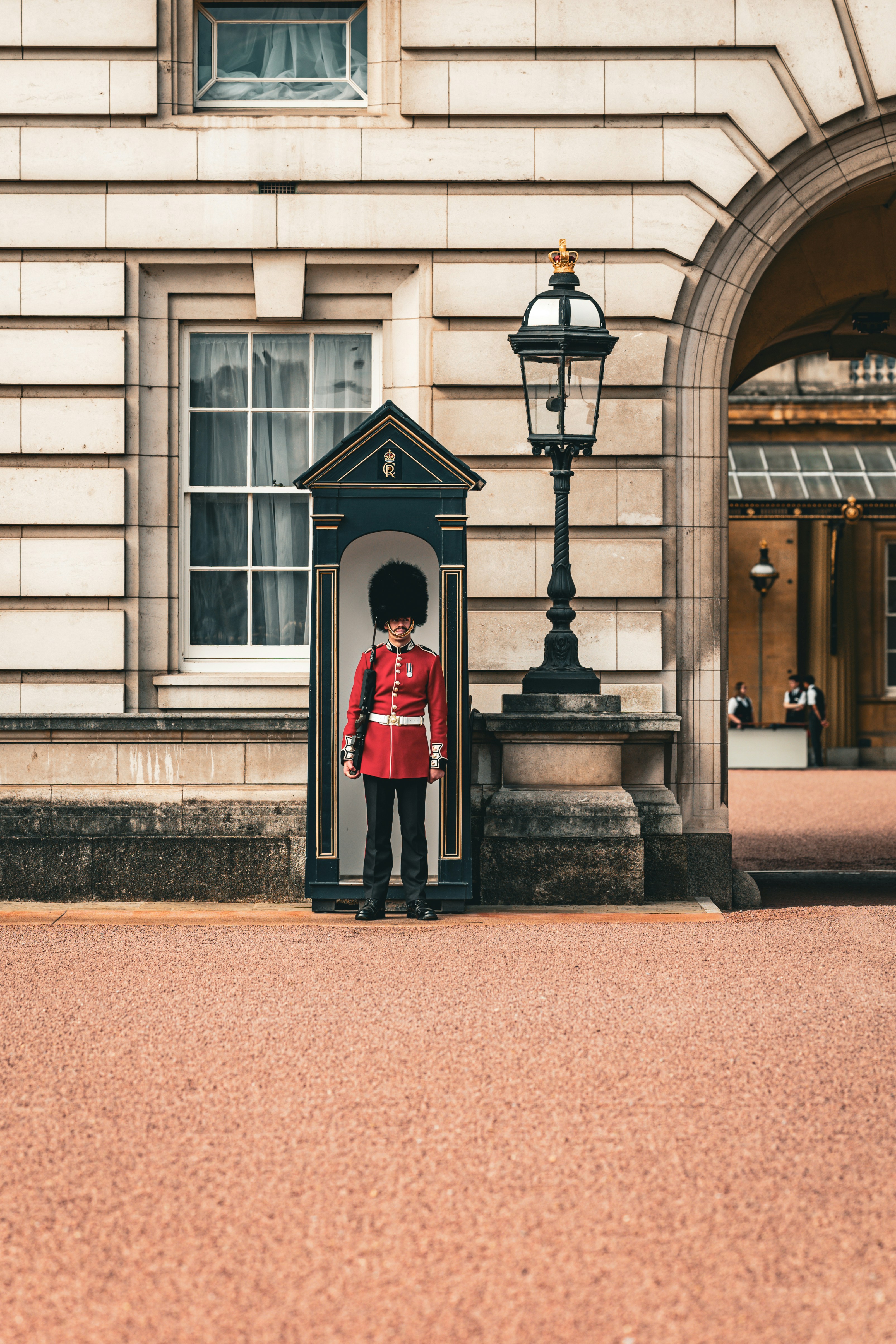 A guard standing in front of a building