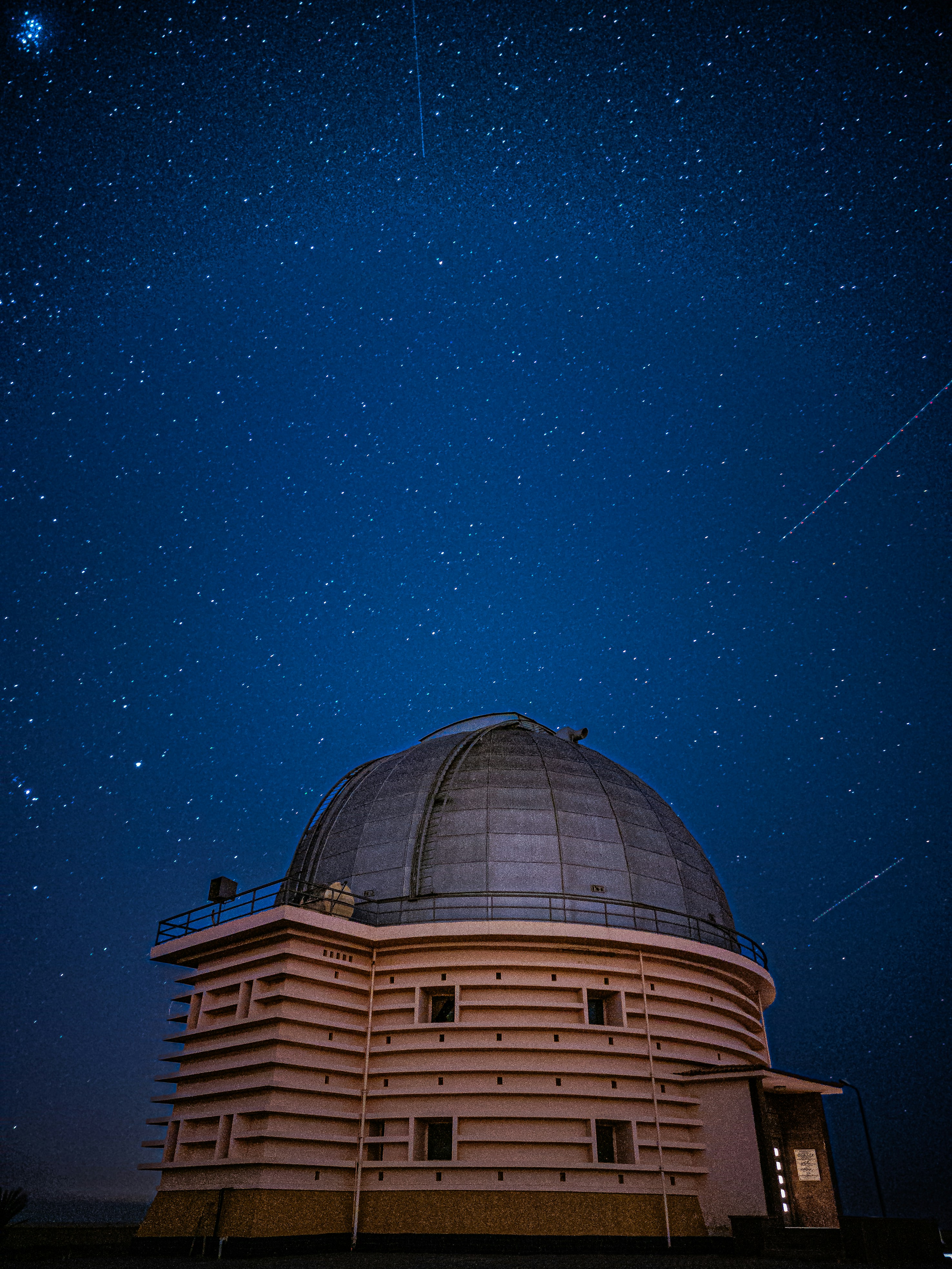 Vast dome beneath a sky filled with countless stars