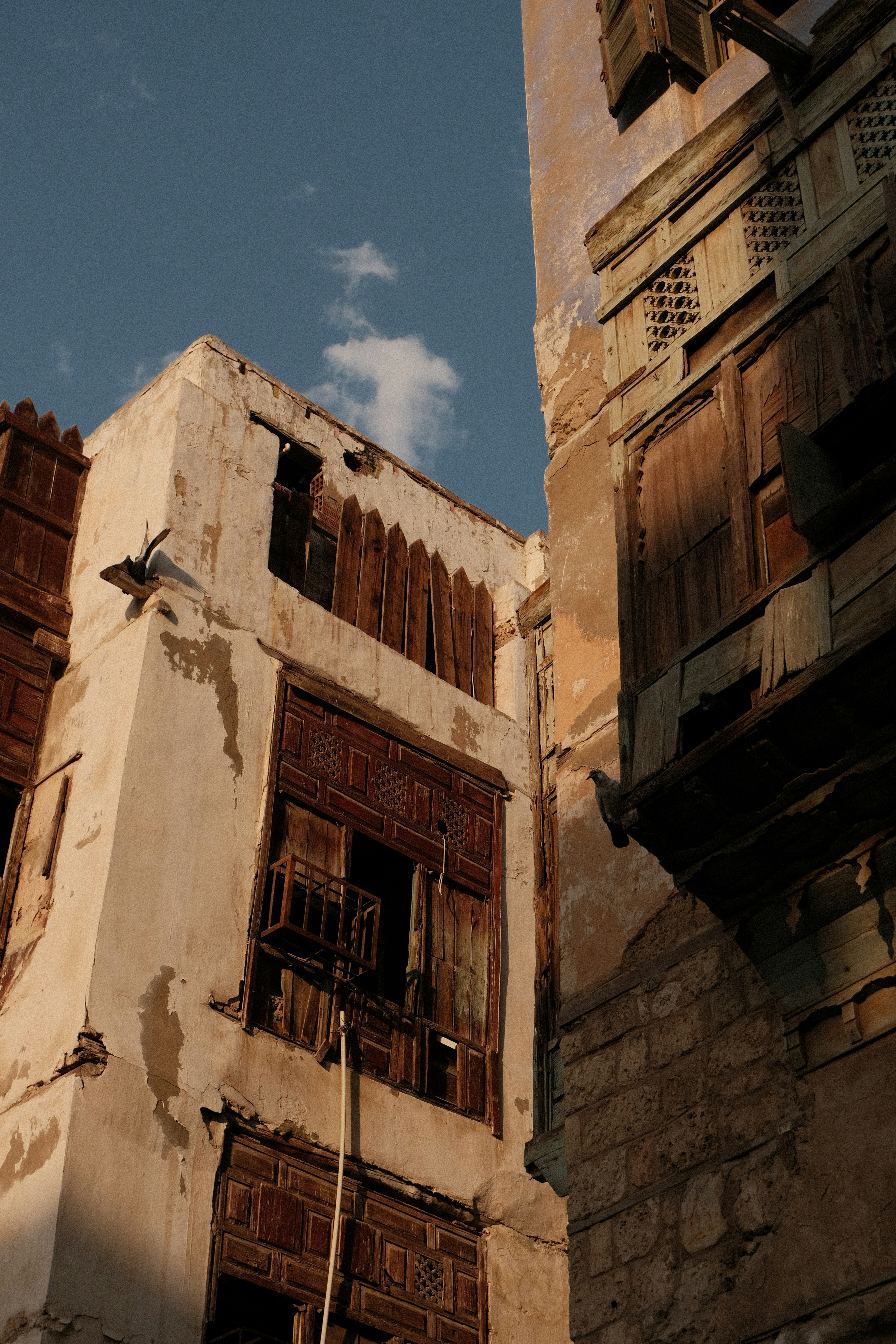 A tall building with a clock on the side of it