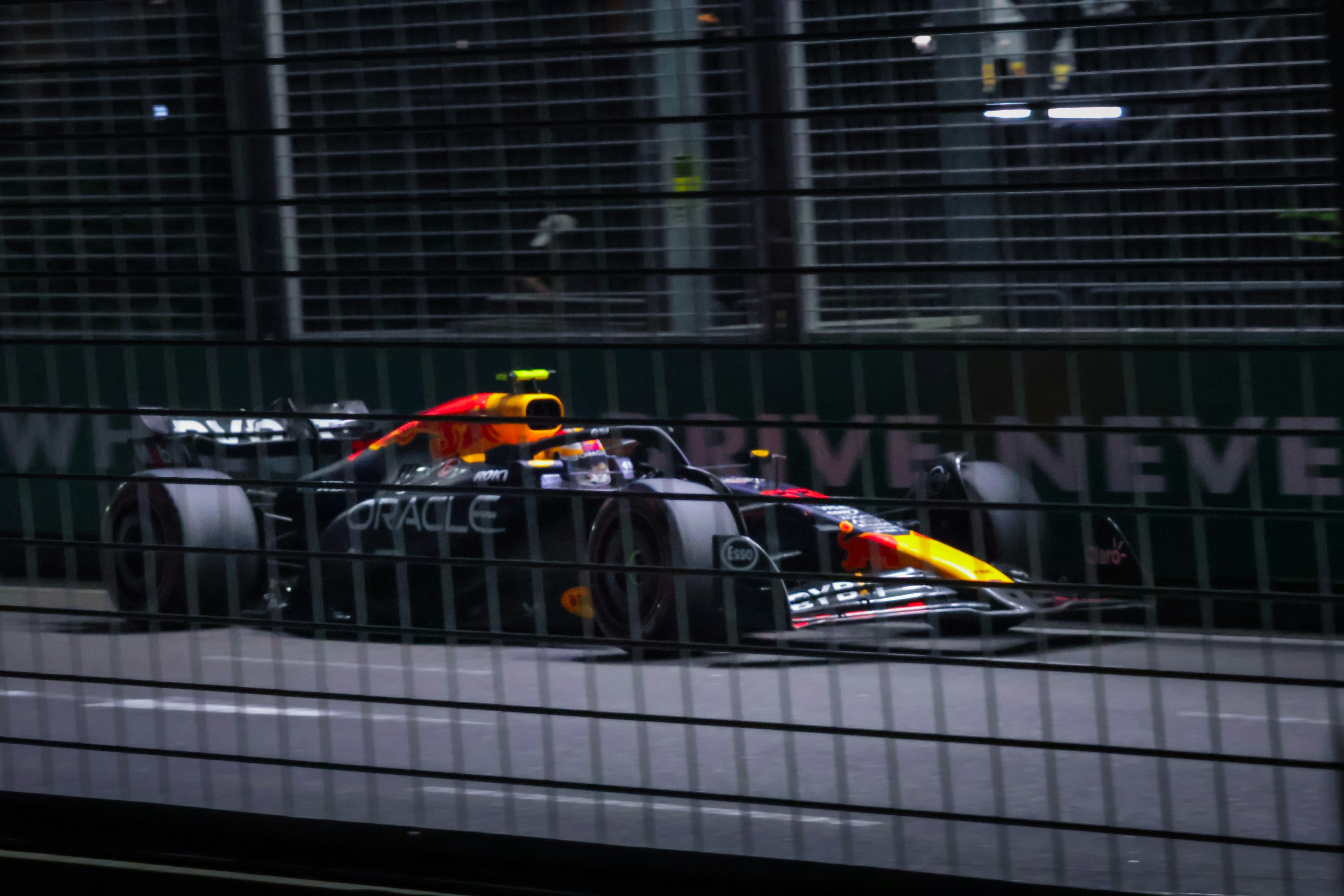 Racing cars on a night track