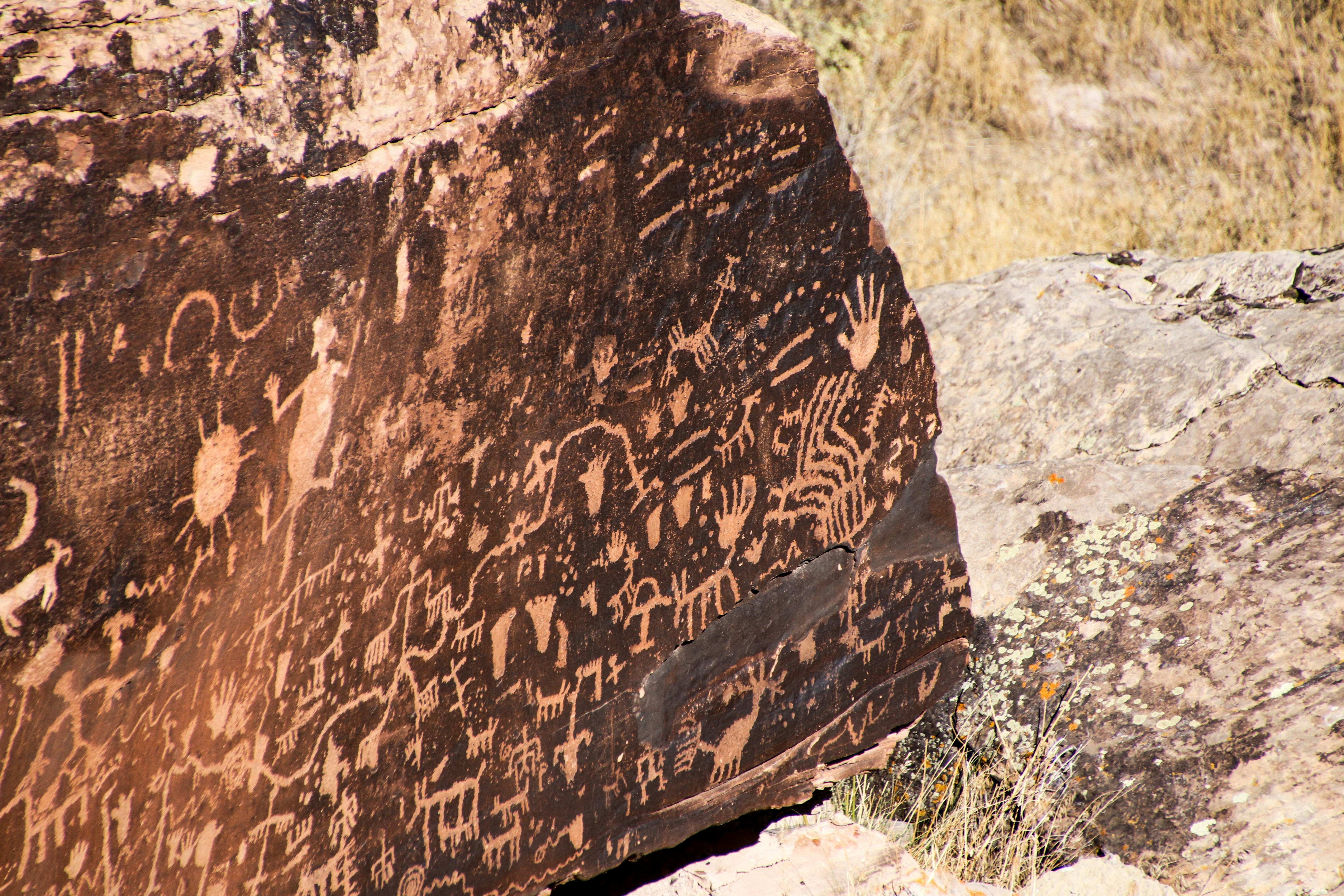 A rock with some writing on it