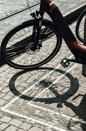 A bicycle parked on the side of the road