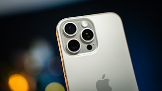A close up of an iPhone with a blurry background
