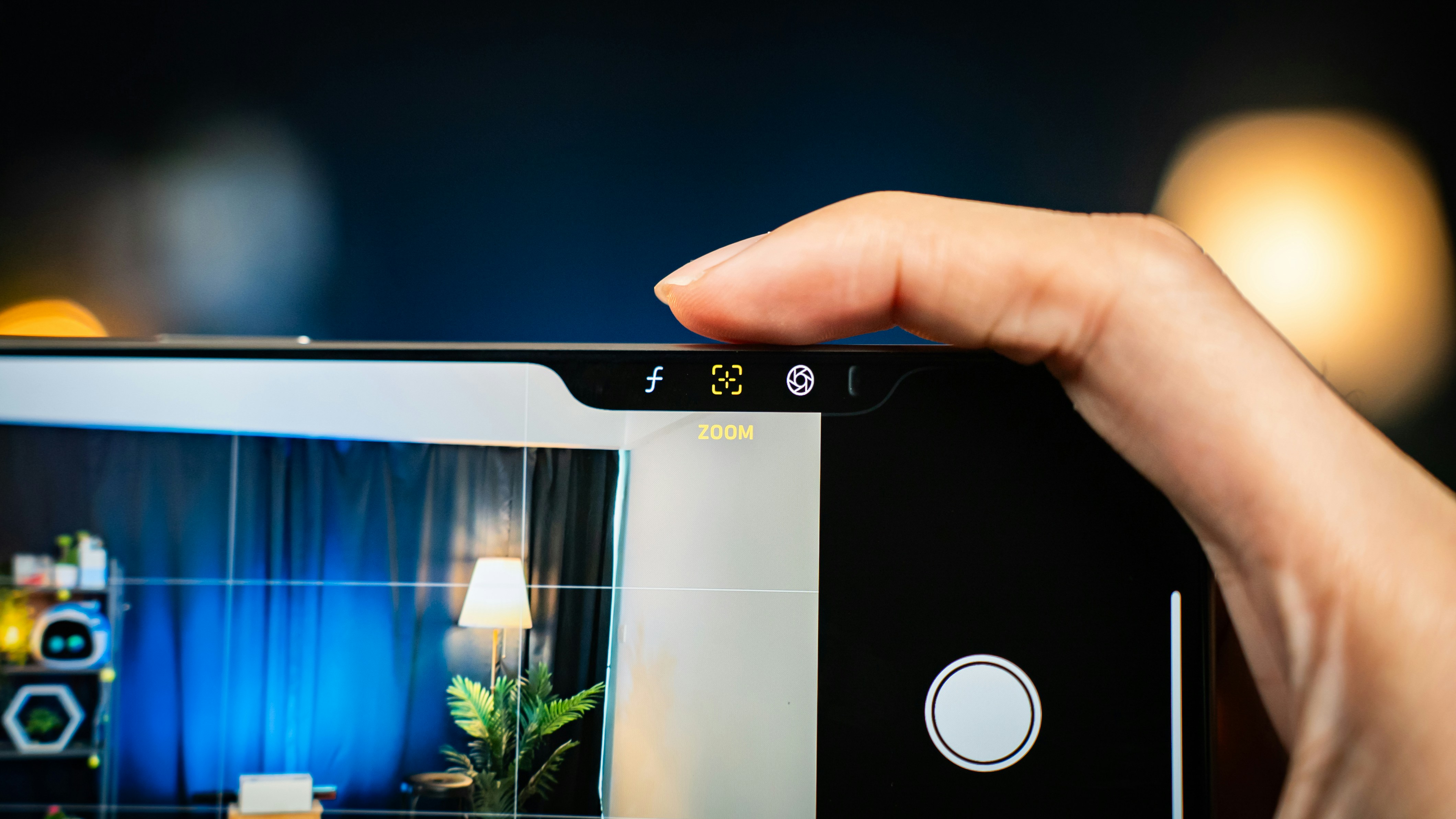 A person taking a picture with a cell phone
