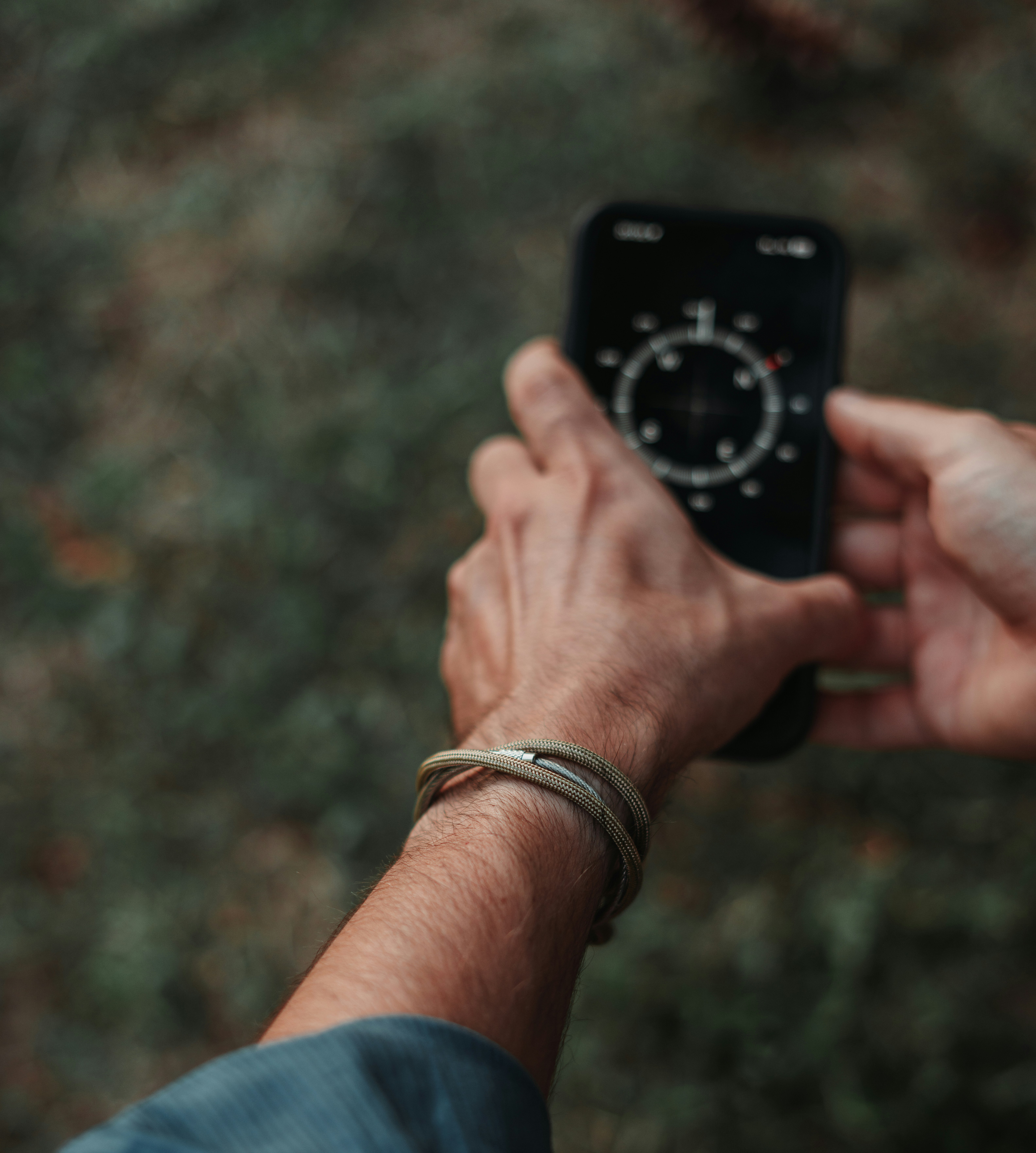 A person taking a picture with a cell phone