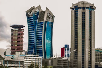 A group of tall buildings sitting next to each other