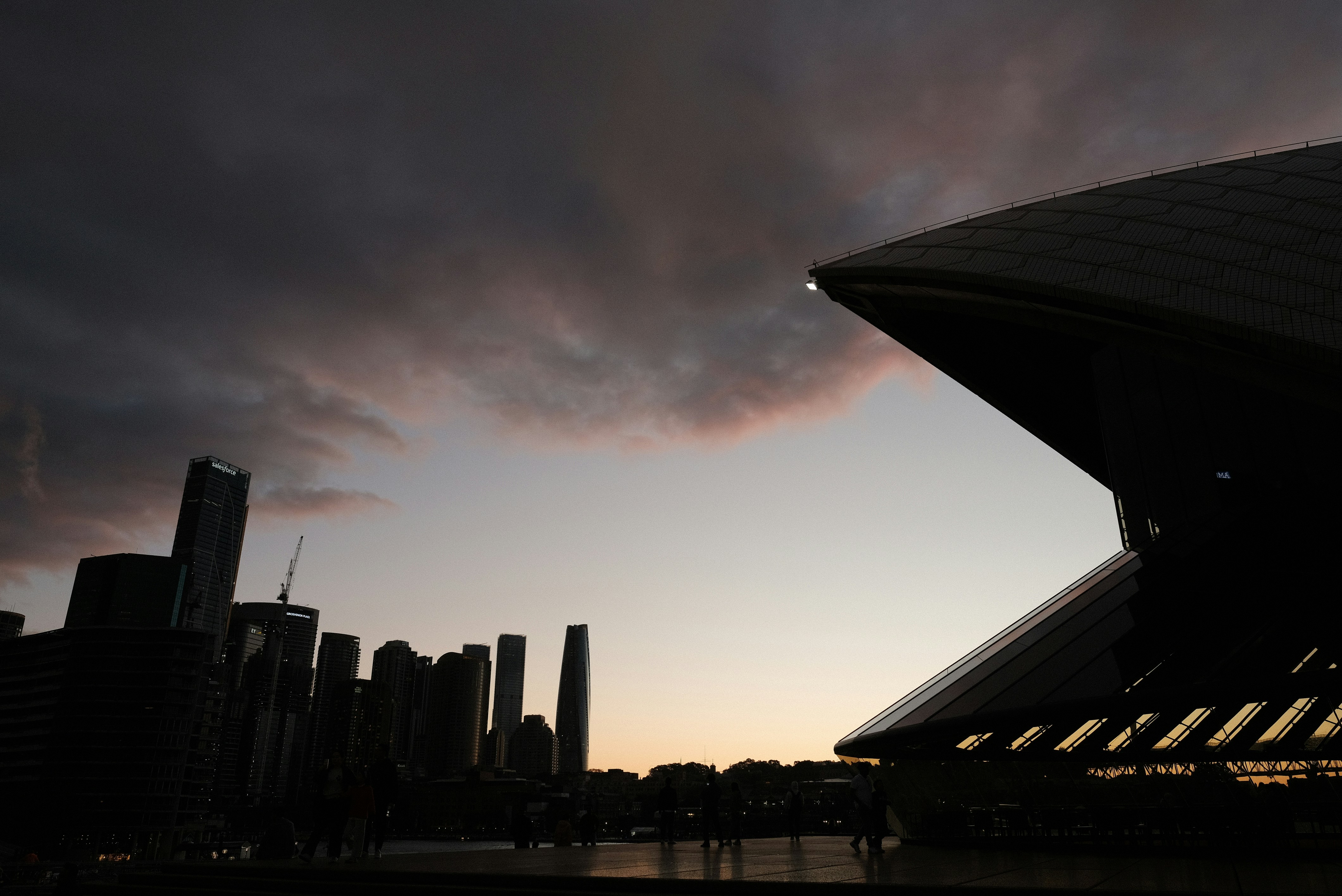 A view of a city skyline at dusk