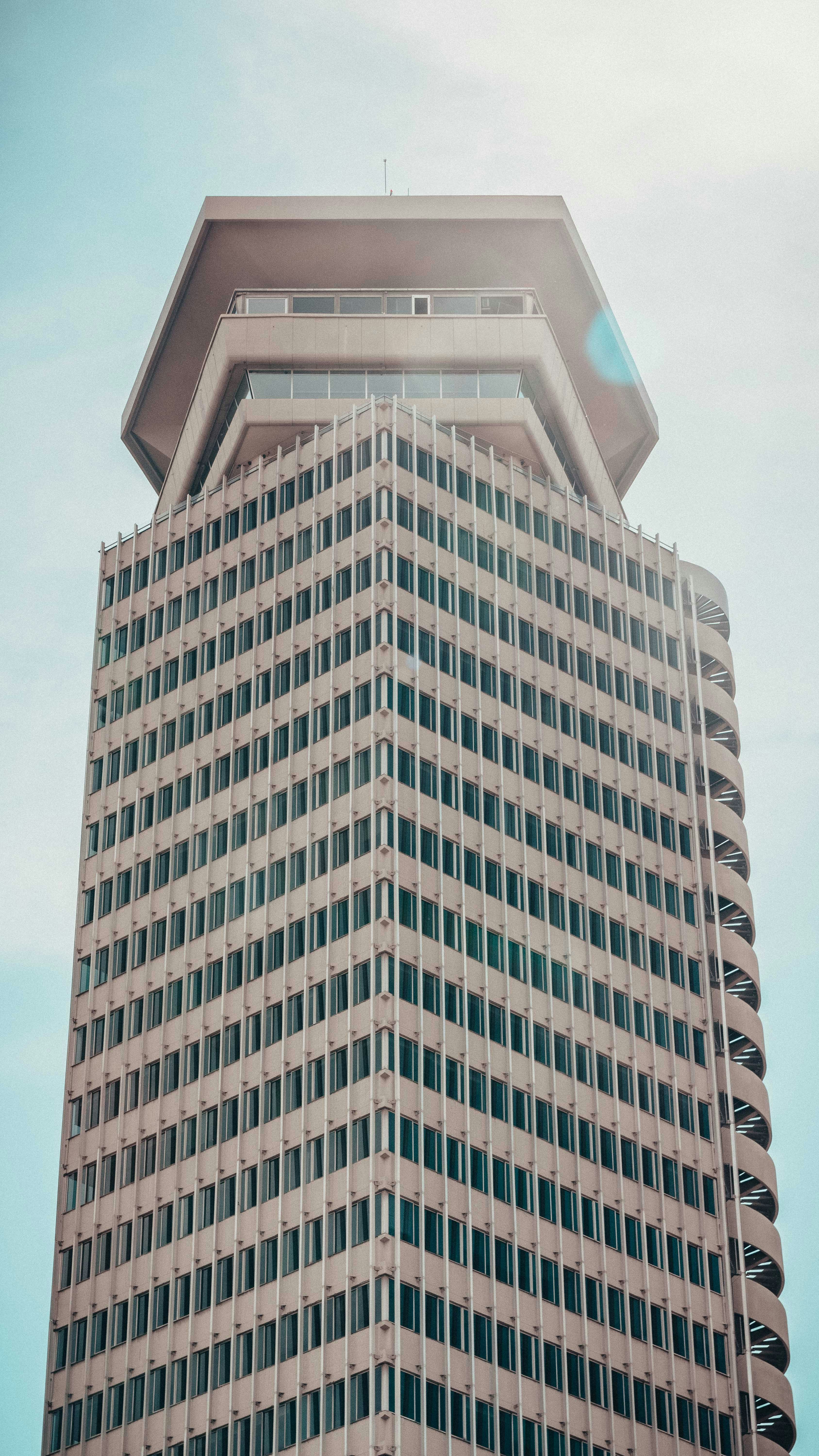 A tall building with a sky background