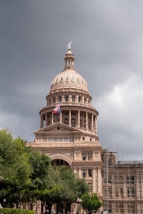 A large building with a flag on top of it