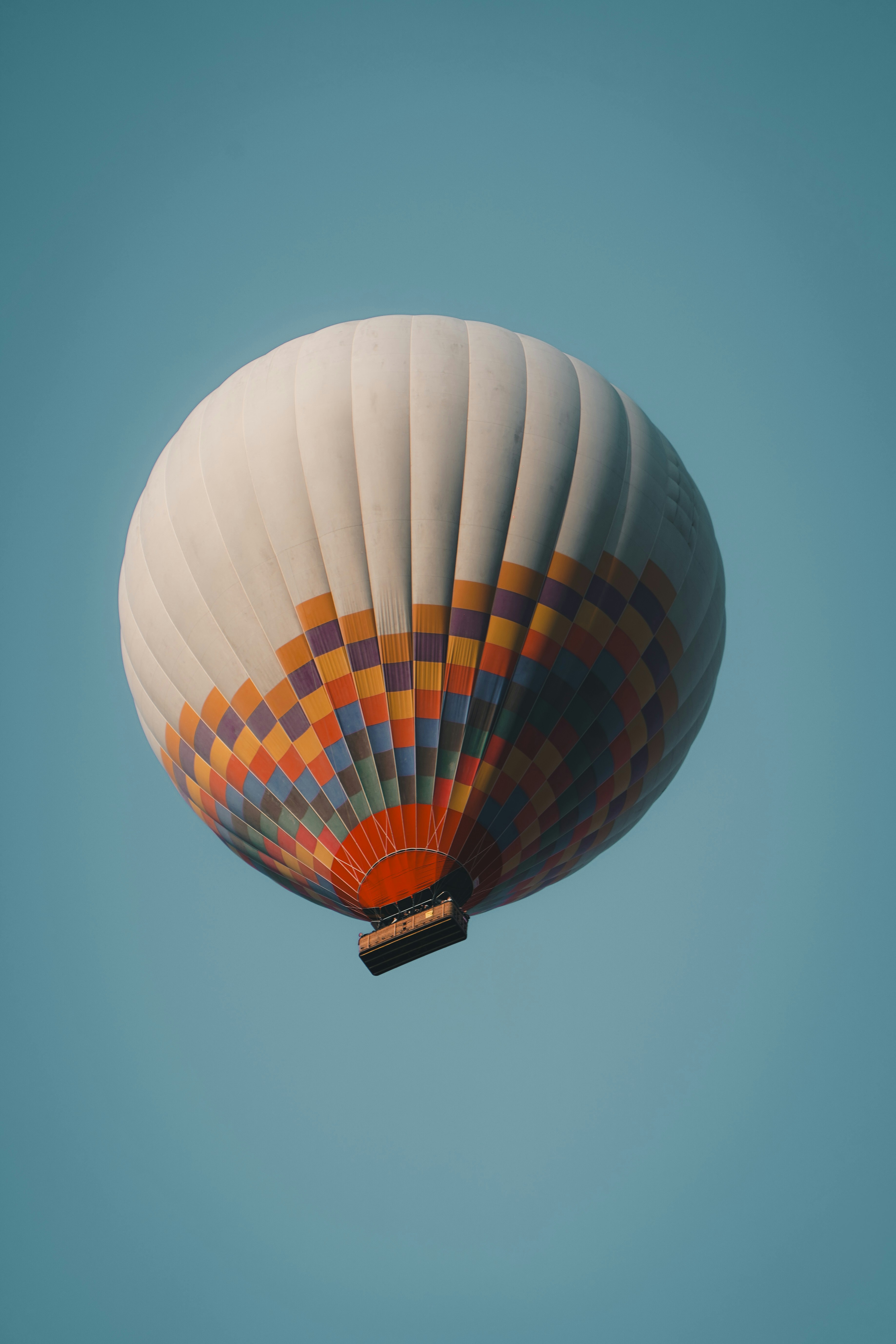 A hot air balloon flying in the sky