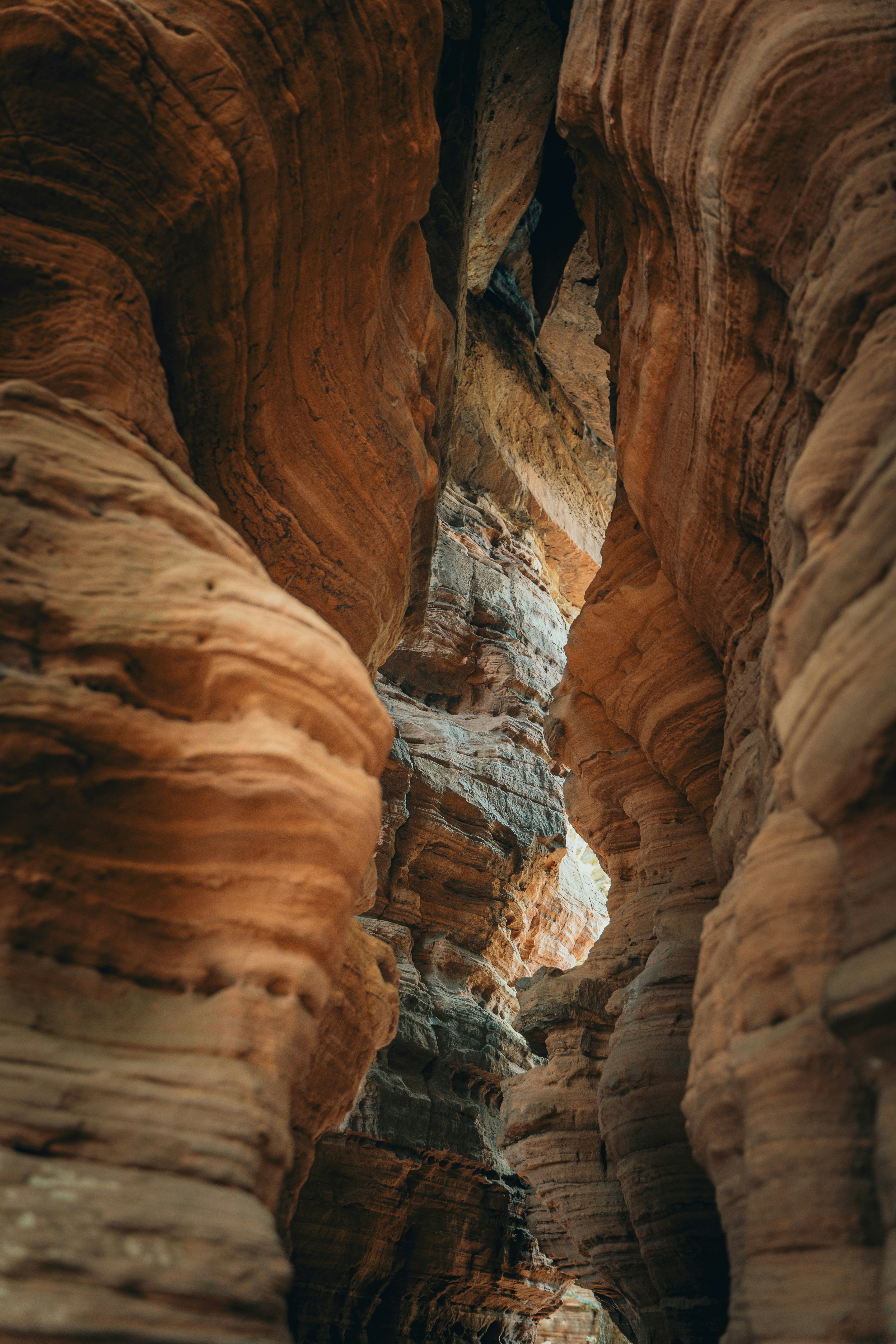 A narrow slot in the side of a mountain