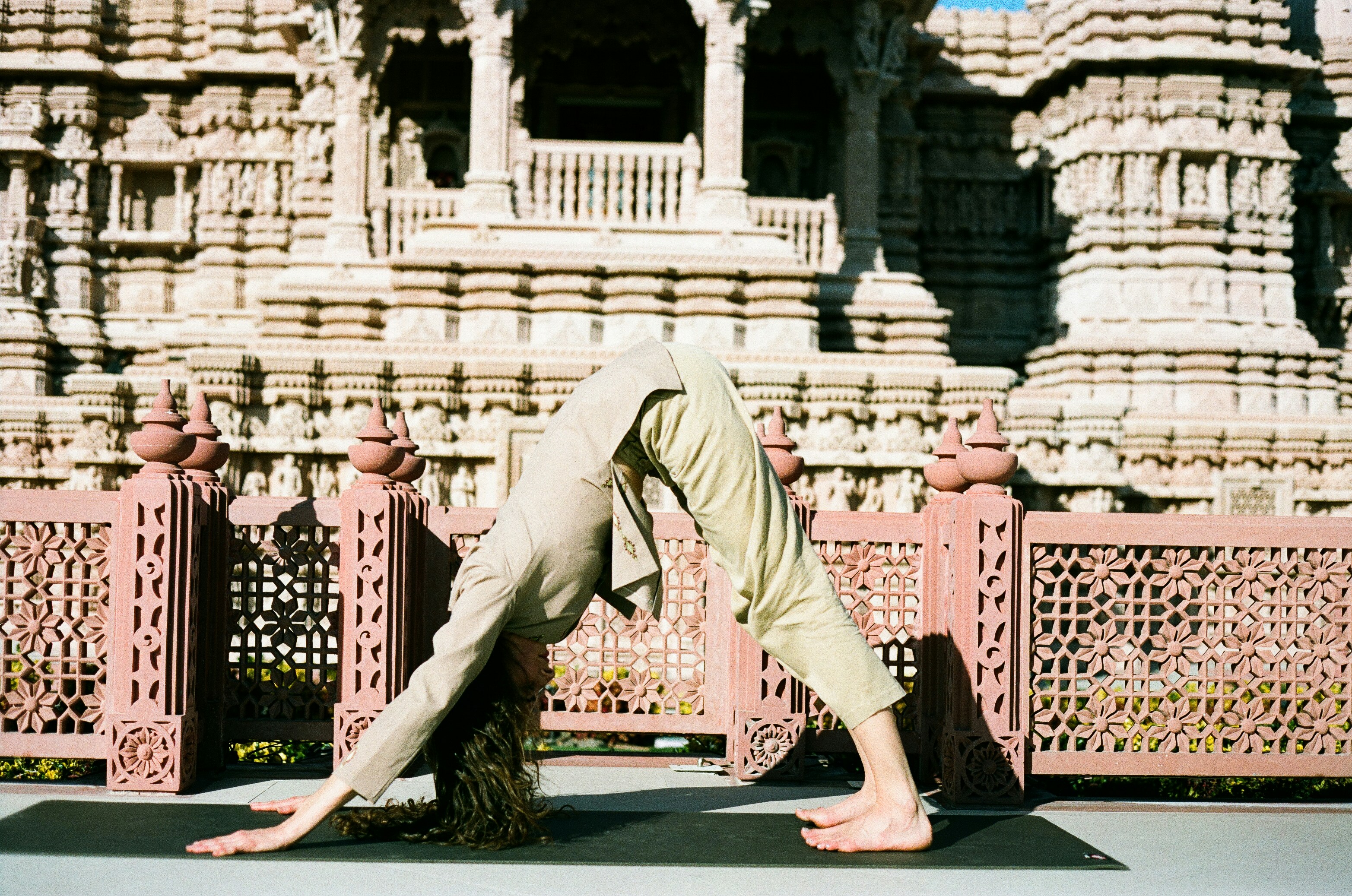 image of a woman engaging in a light activity like walking or yoga, signifying recovery - mesh revision surgery