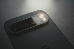 A close up of a cell phone on a table