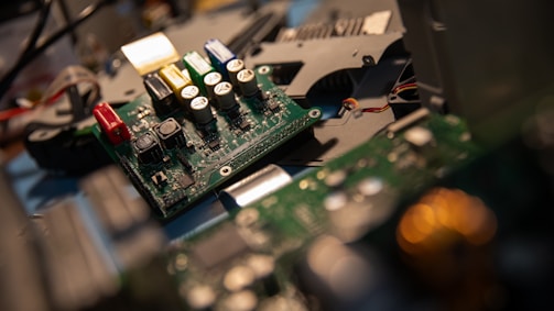 A close up of a computer motherboard with many wires