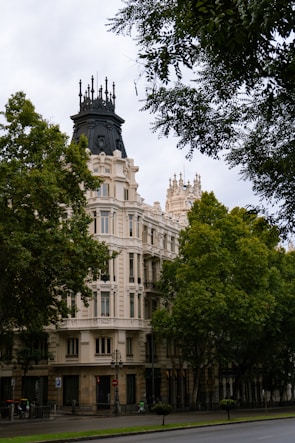 A large building with a clock on the top of it