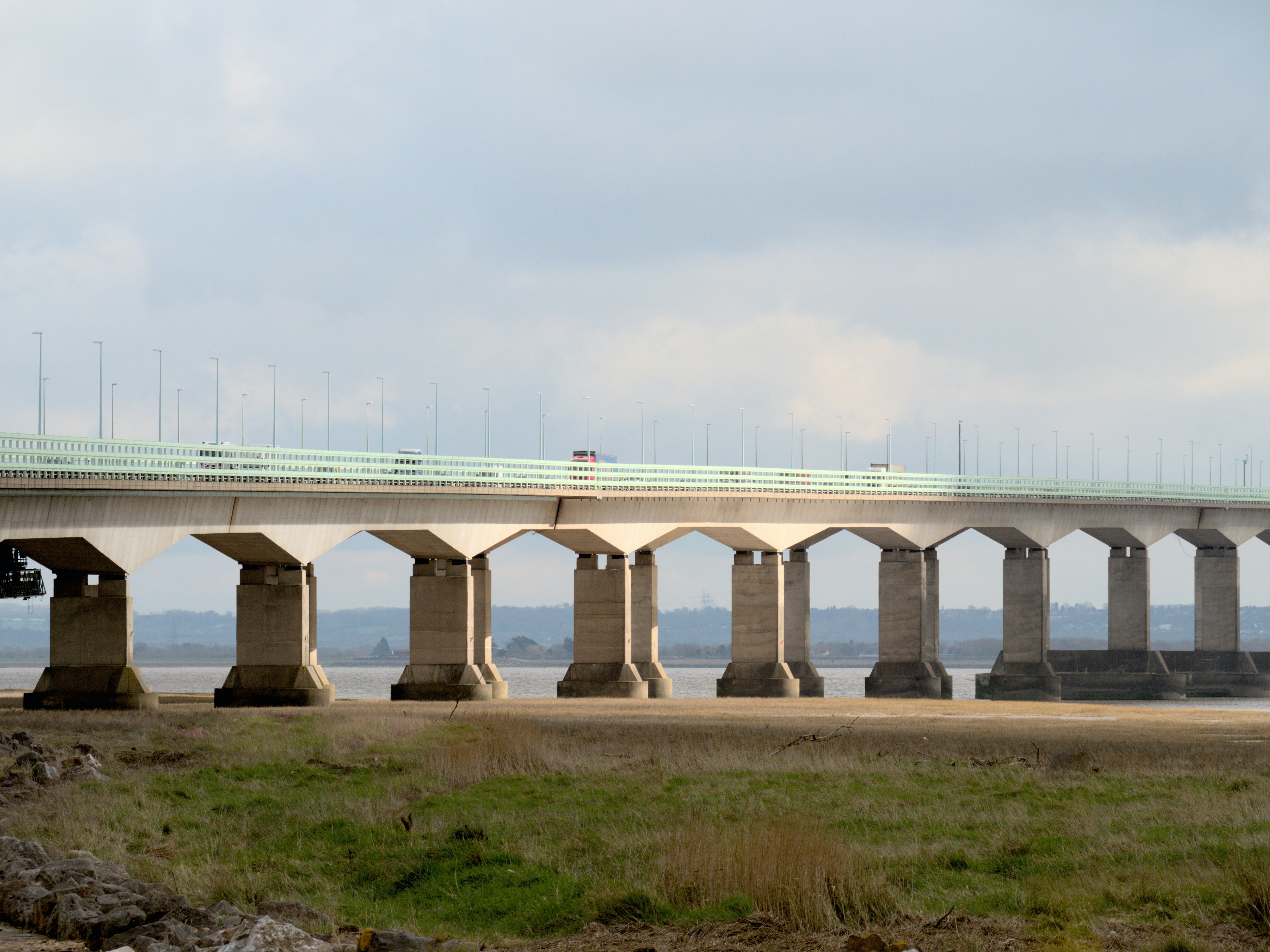 A large bridge over a large body of water