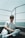 A man sitting on the deck of a boat