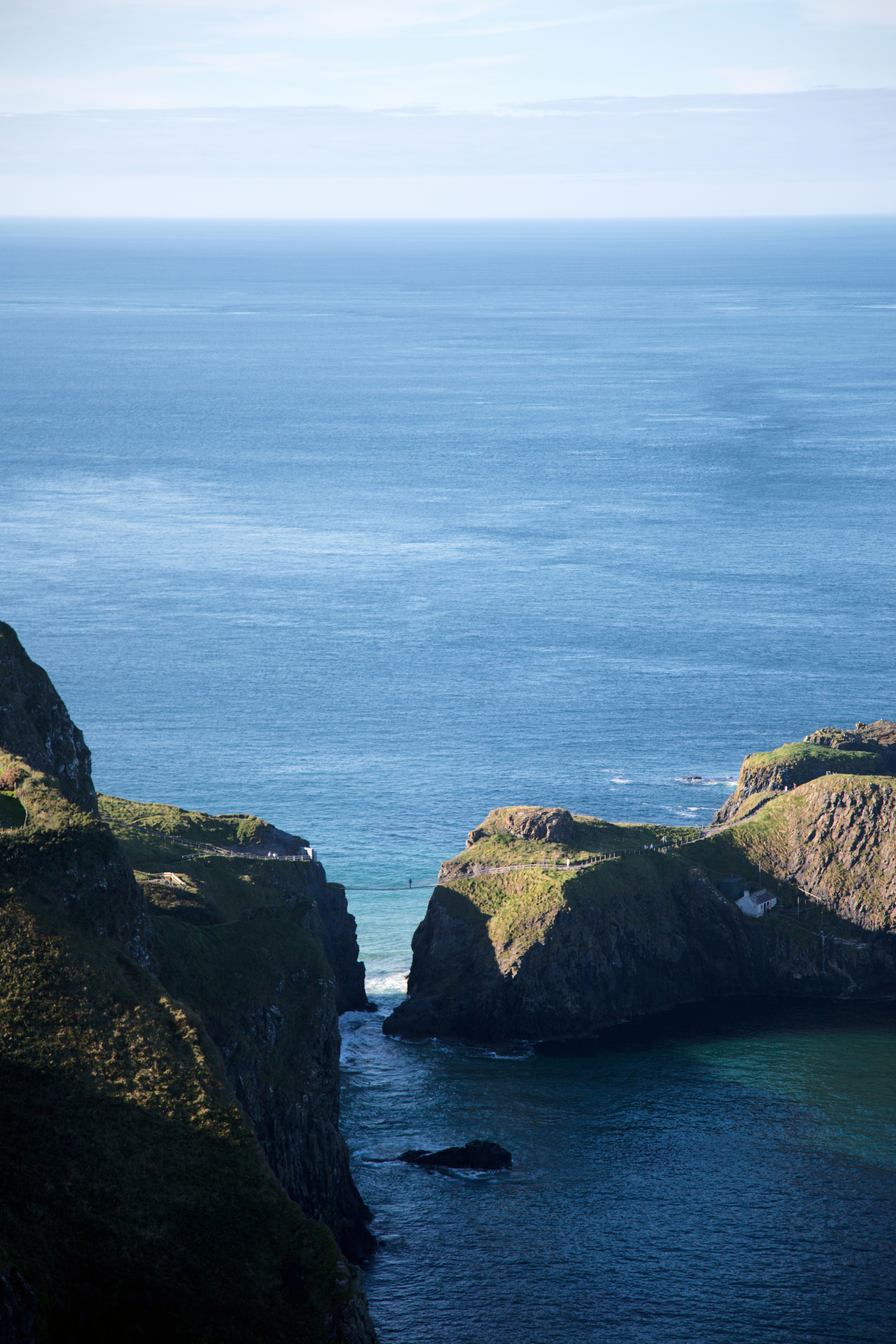 A large body of water surrounded by mountains