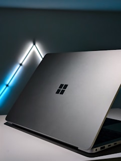 A laptop computer sitting on top of a table