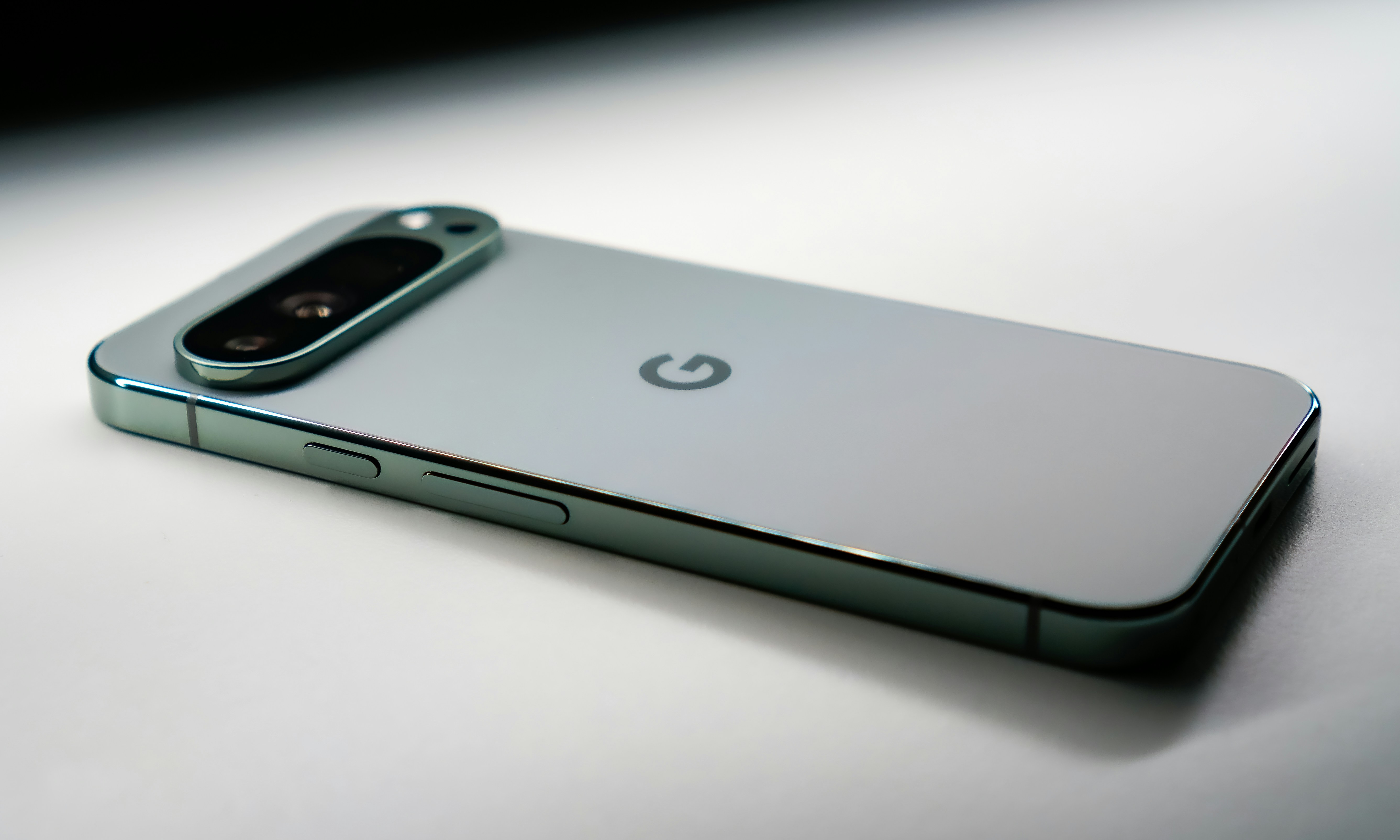 A close up of a cell phone on a table