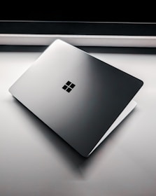 A laptop computer sitting on top of a table