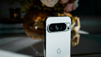 A close up of a cell phone on a table