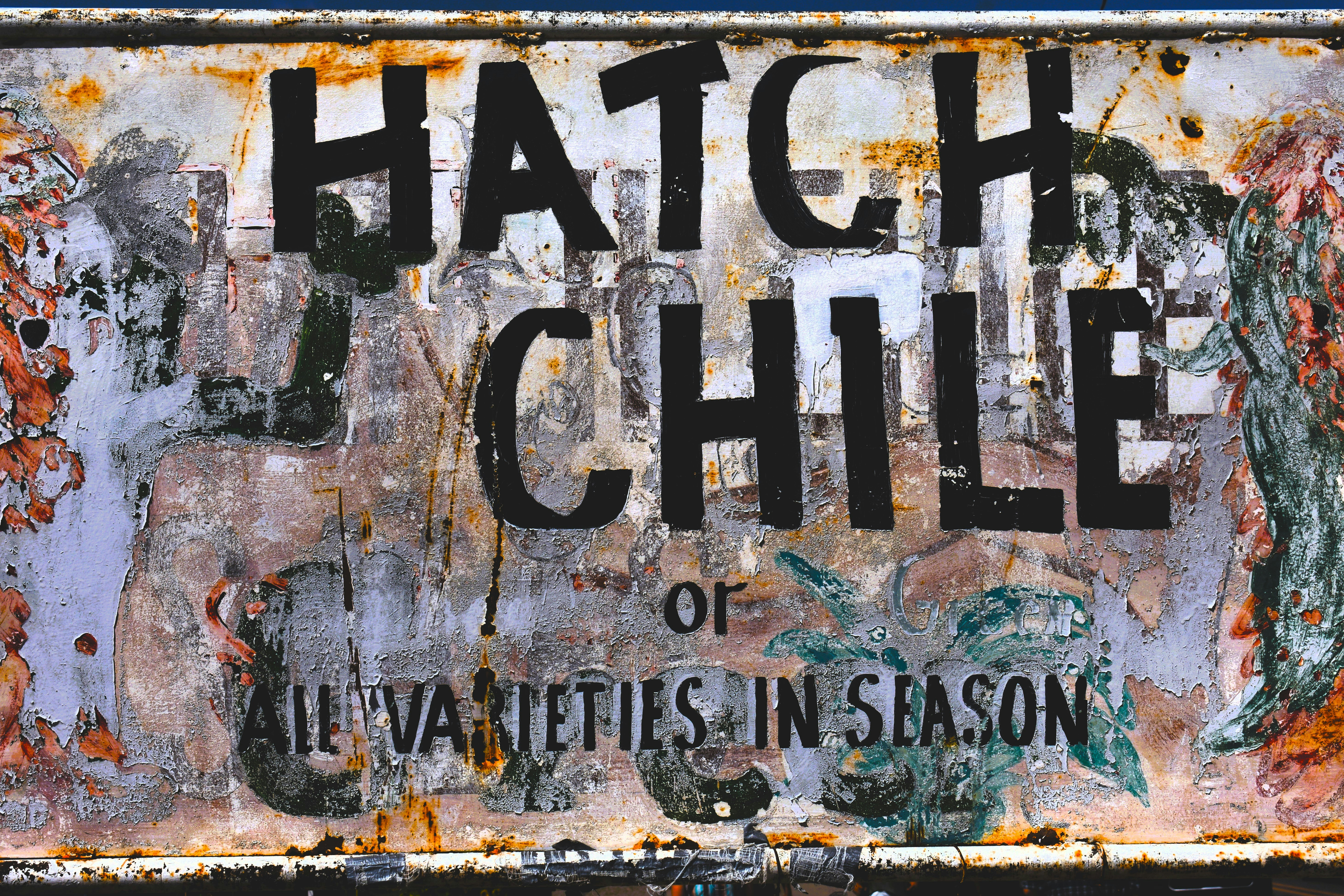 Un letrero que dice escotilla y chile