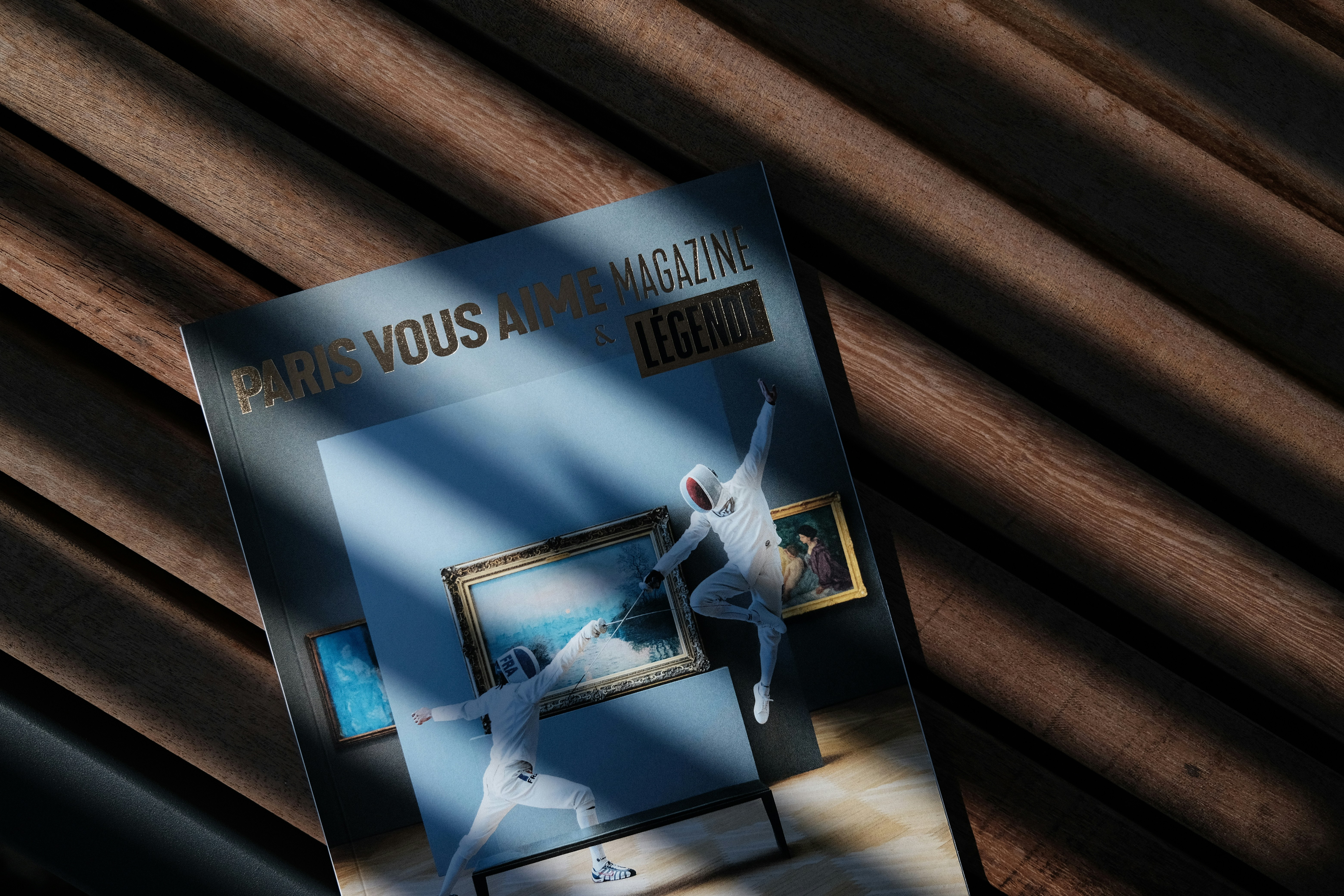 A close up of a dvd on a wooden surface, 