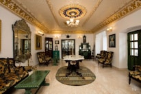A living room filled with furniture and a chandelier