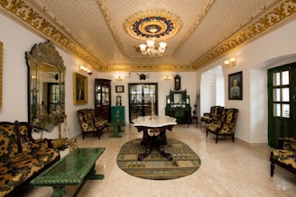 A living room filled with furniture and a chandelier