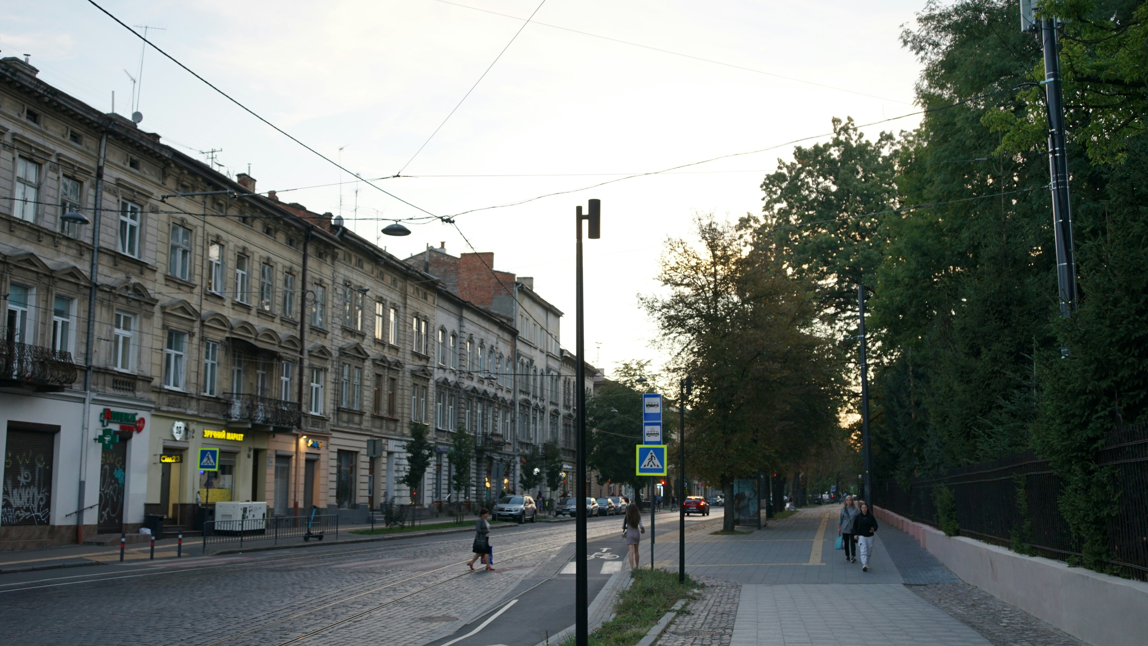 A person riding a skateboard on a city street