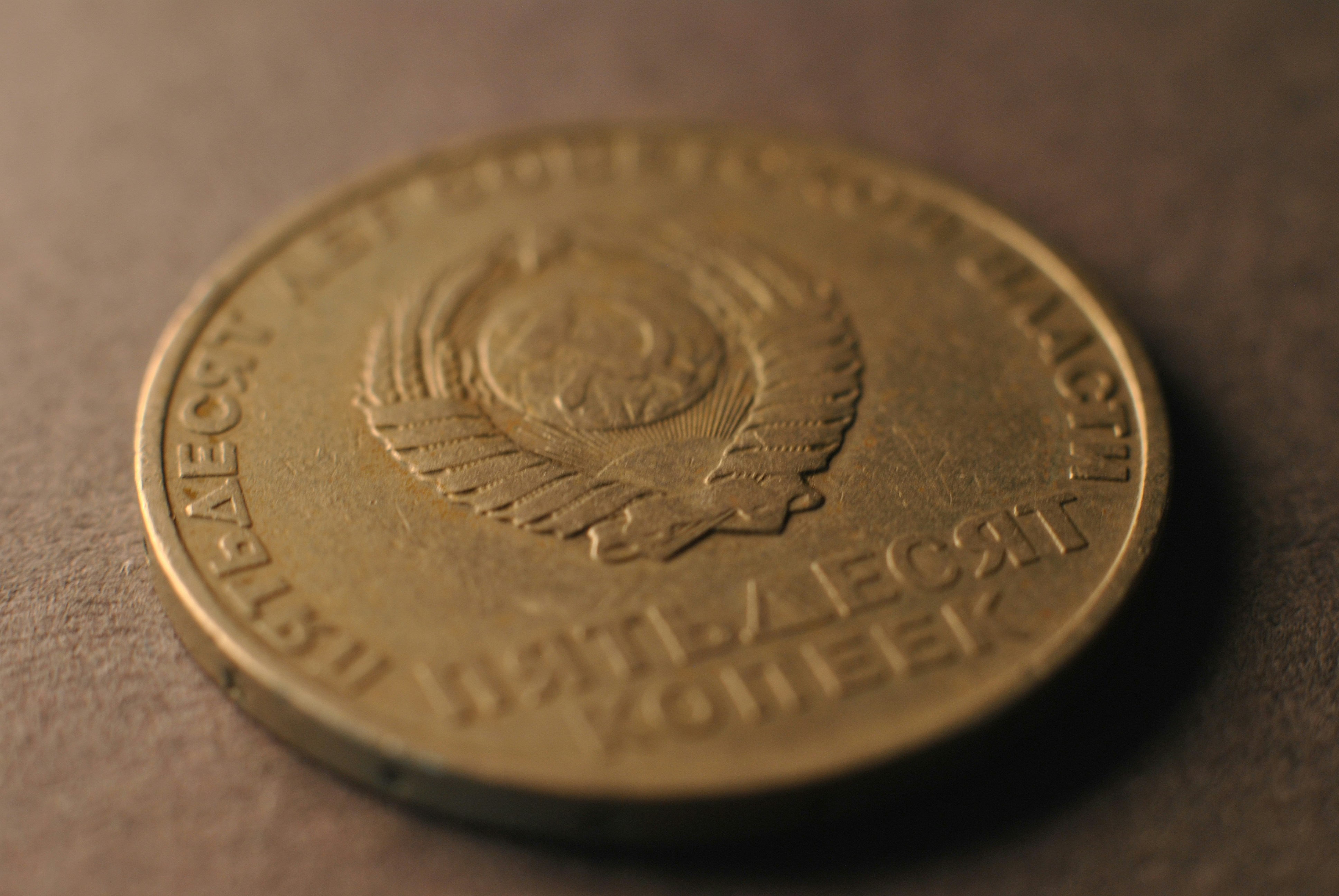 A close up of a coin on a table