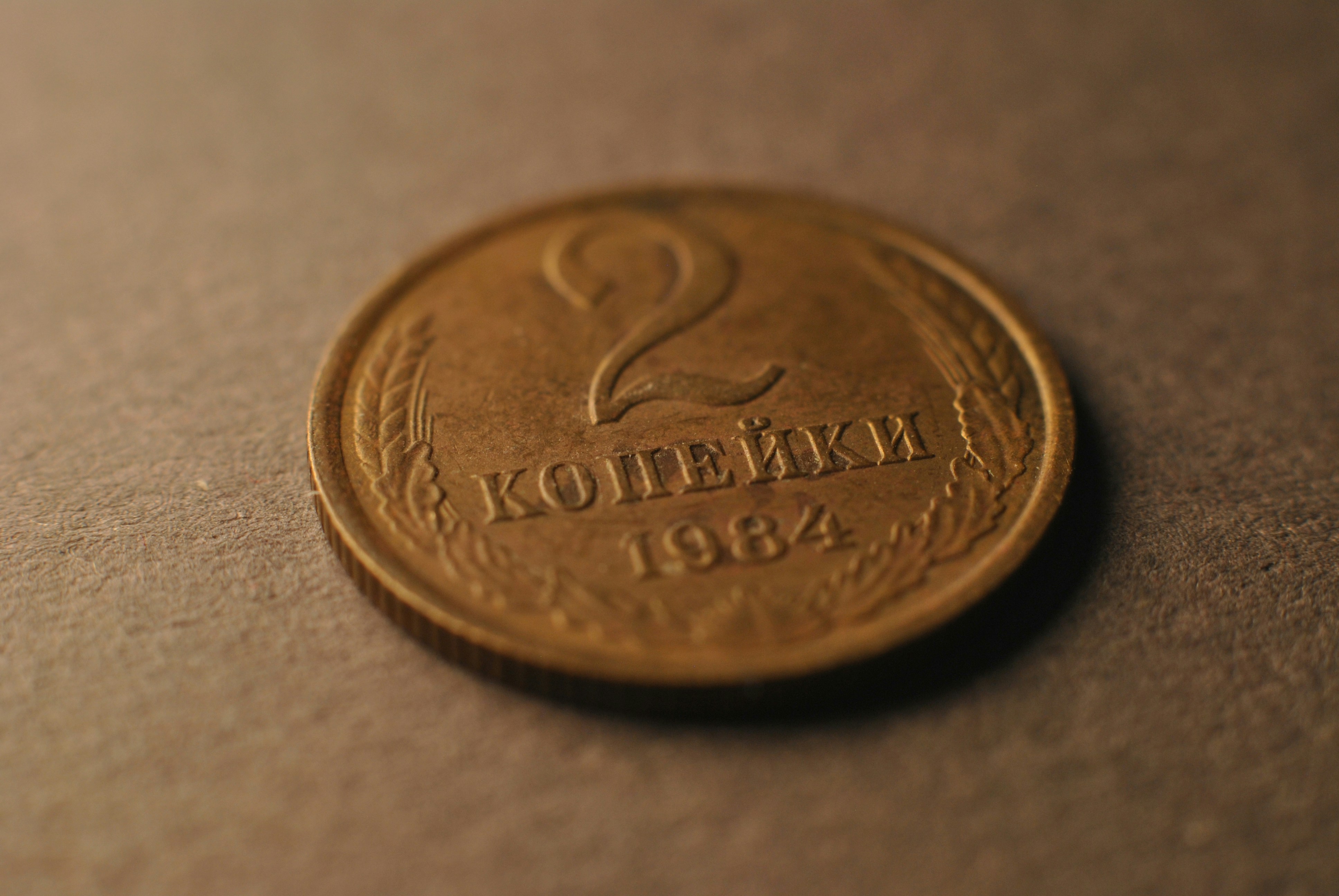 A close up of a coin on a table