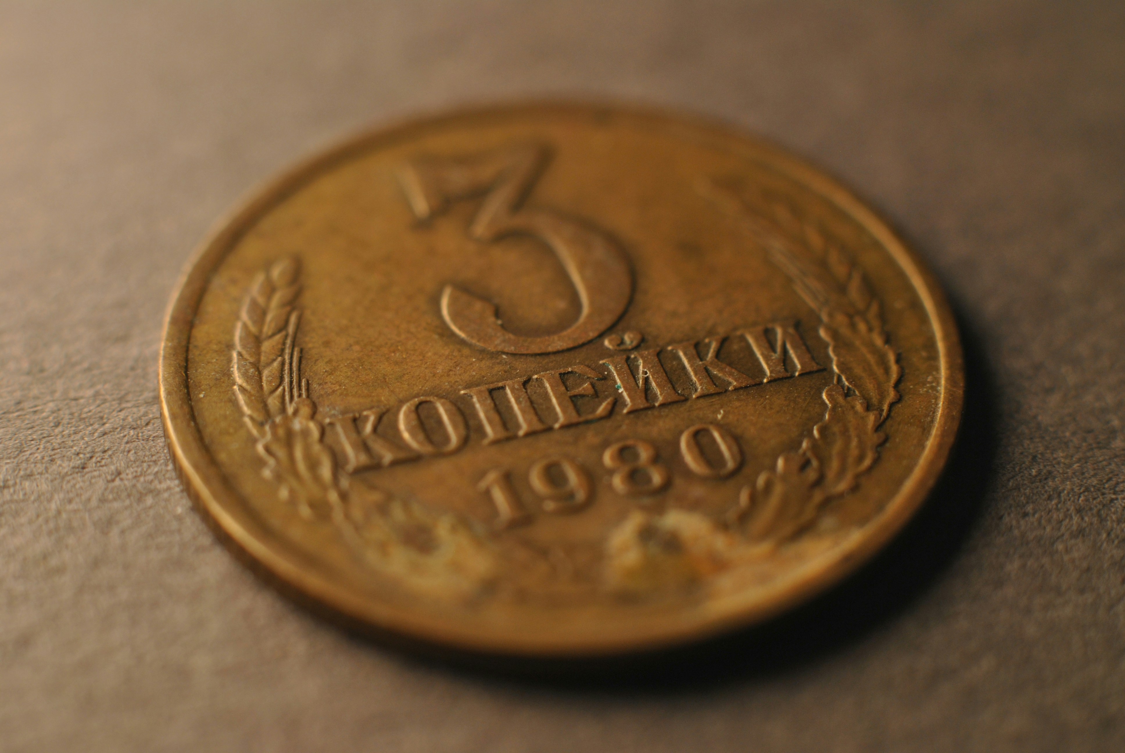 A close up of a coin on a table