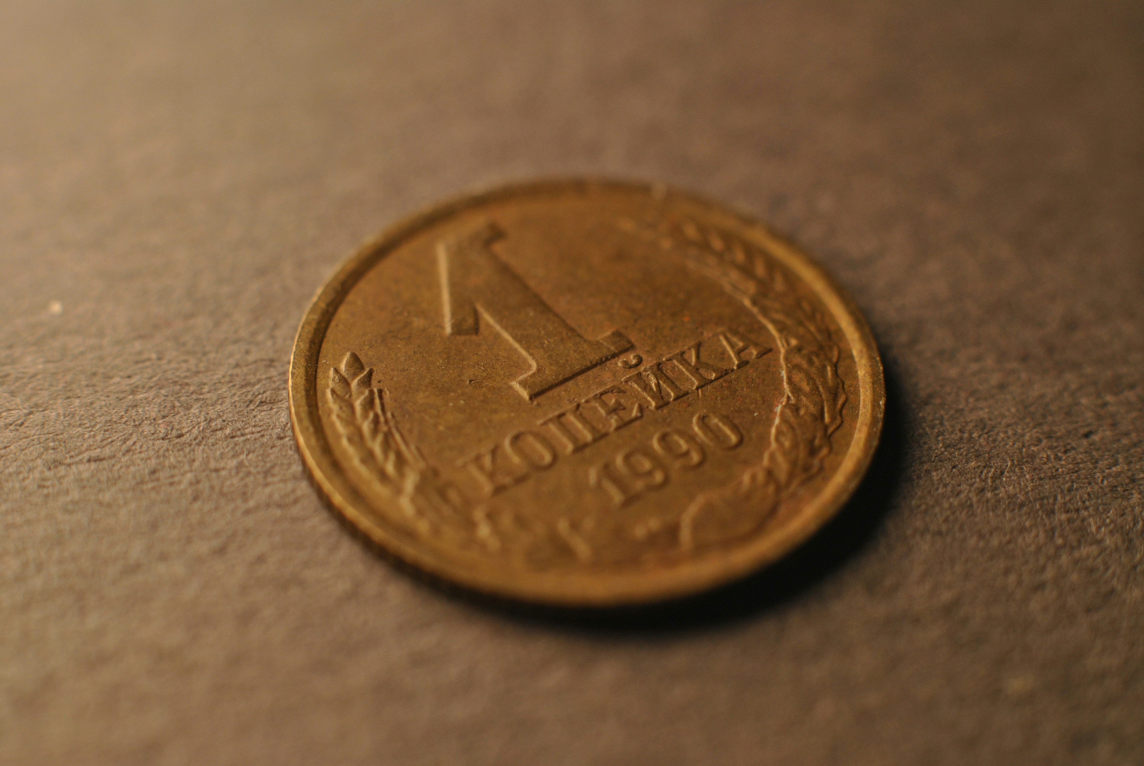 A close up of a coin on a table
