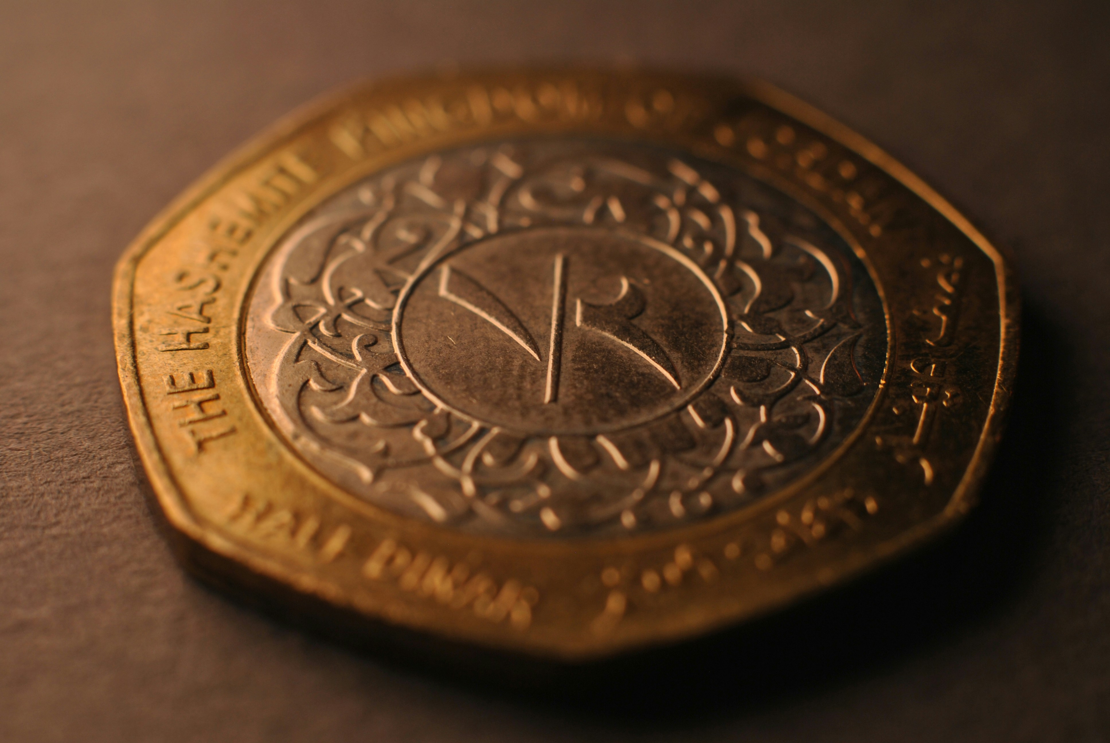 A close up of a coin on a table