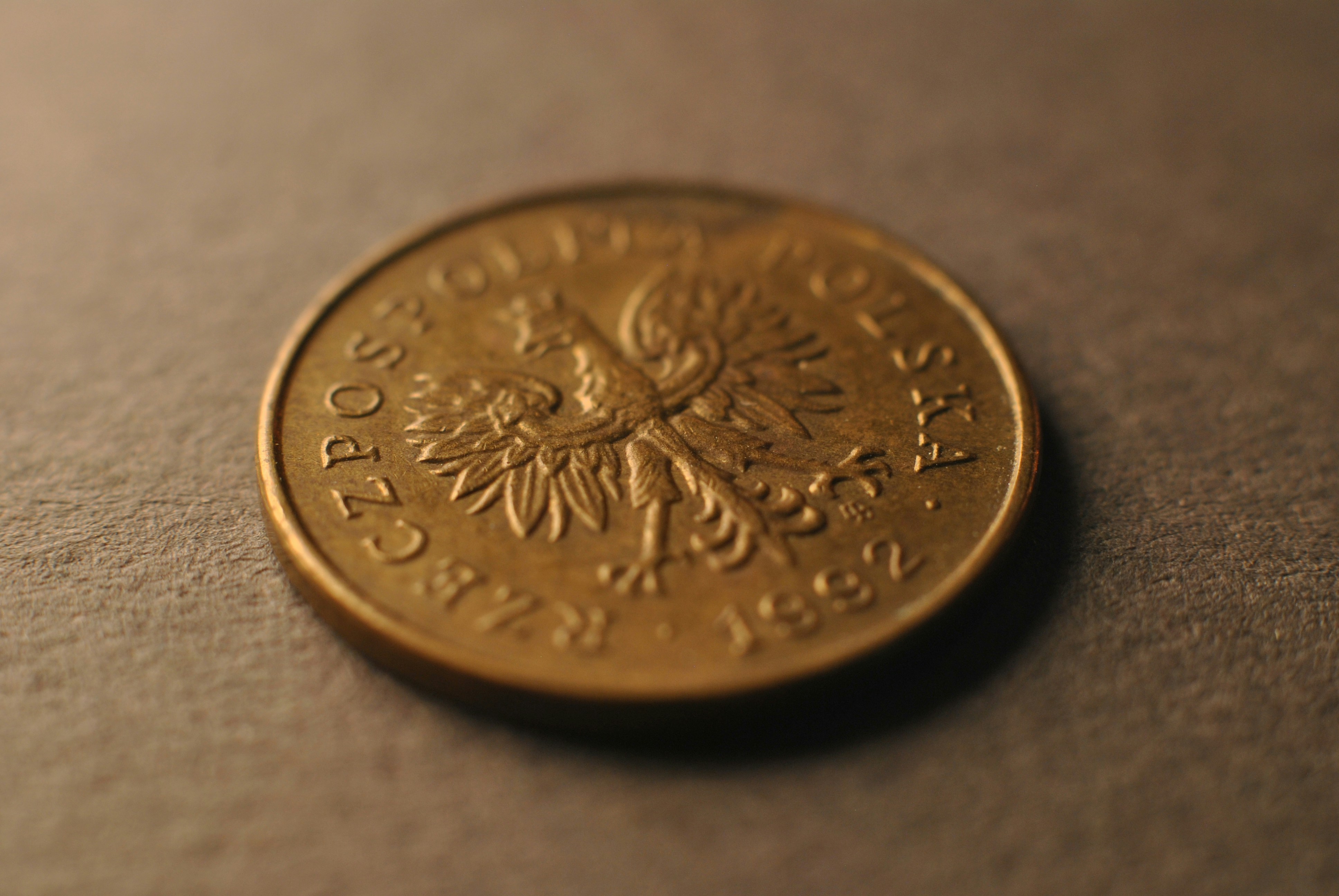 A close up of a coin on a table