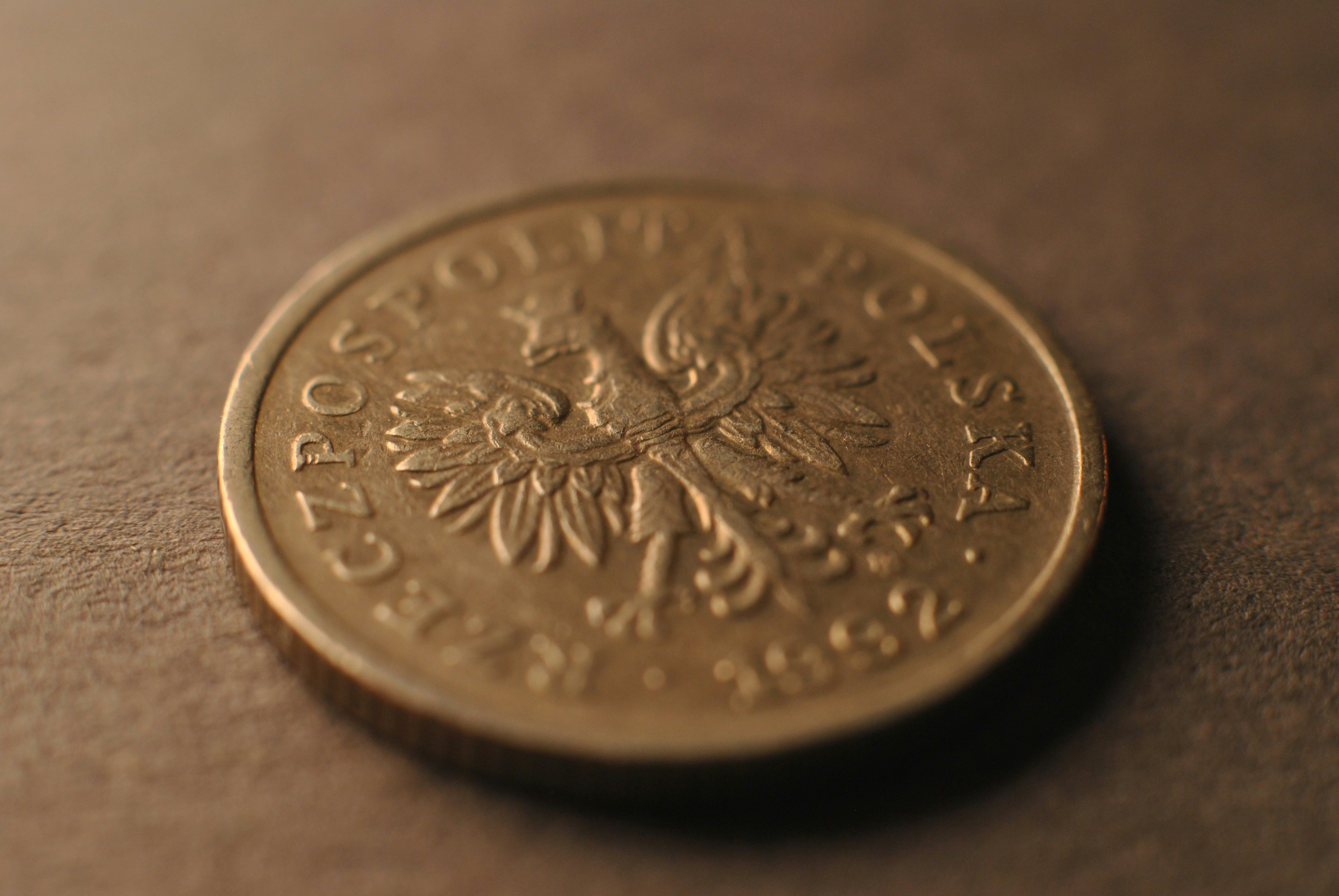 A close up of a coin on a table